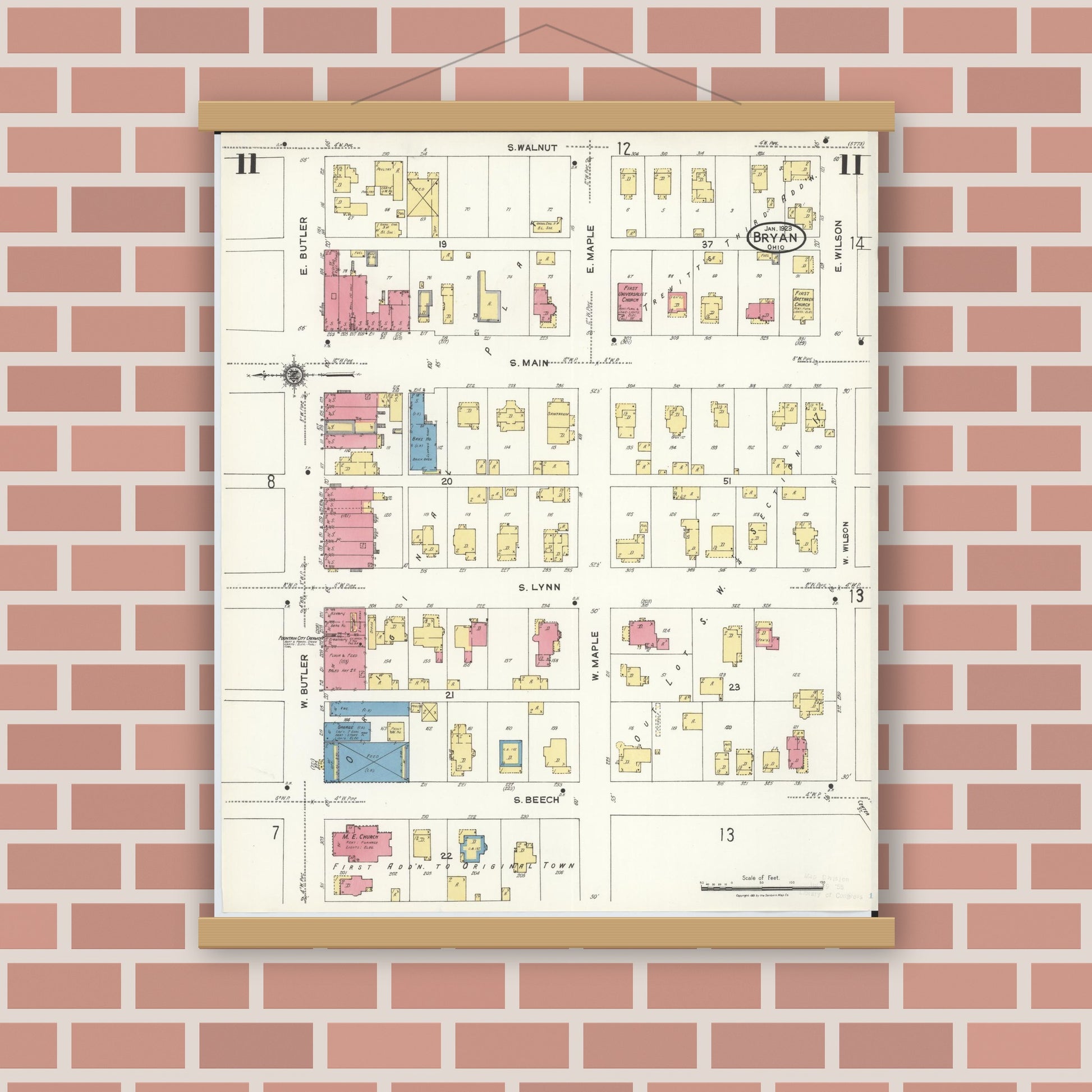 Old map wall art mockup — magnetic wood frame on brick wall — Sanborn Fire Insurance Map from Bryan, Williams County, Ohio (1923), Sheet #0011