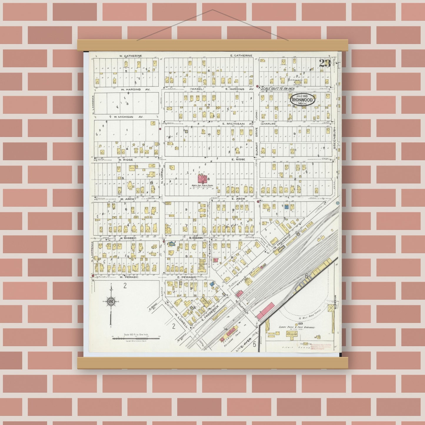 Old map wall art mockup — magnetic wood frame on brick wall — Sanborn Fire Insurance Map from Ironwood, Gogebic County, Michigan (1921), Sheet #0023