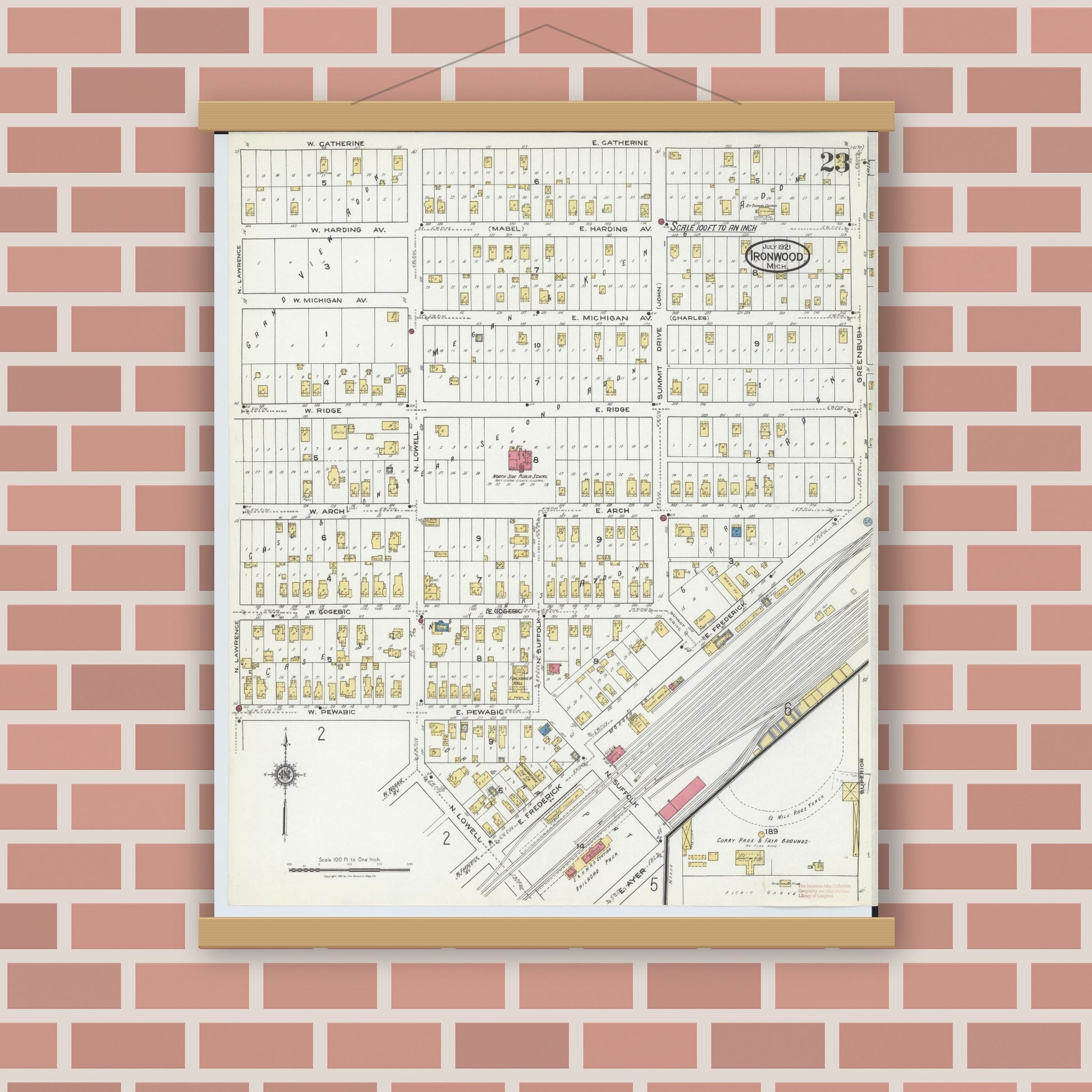 Old map wall art mockup — magnetic wood frame on brick wall — Sanborn Fire Insurance Map from Ironwood, Gogebic County, Michigan (1921), Sheet #0023