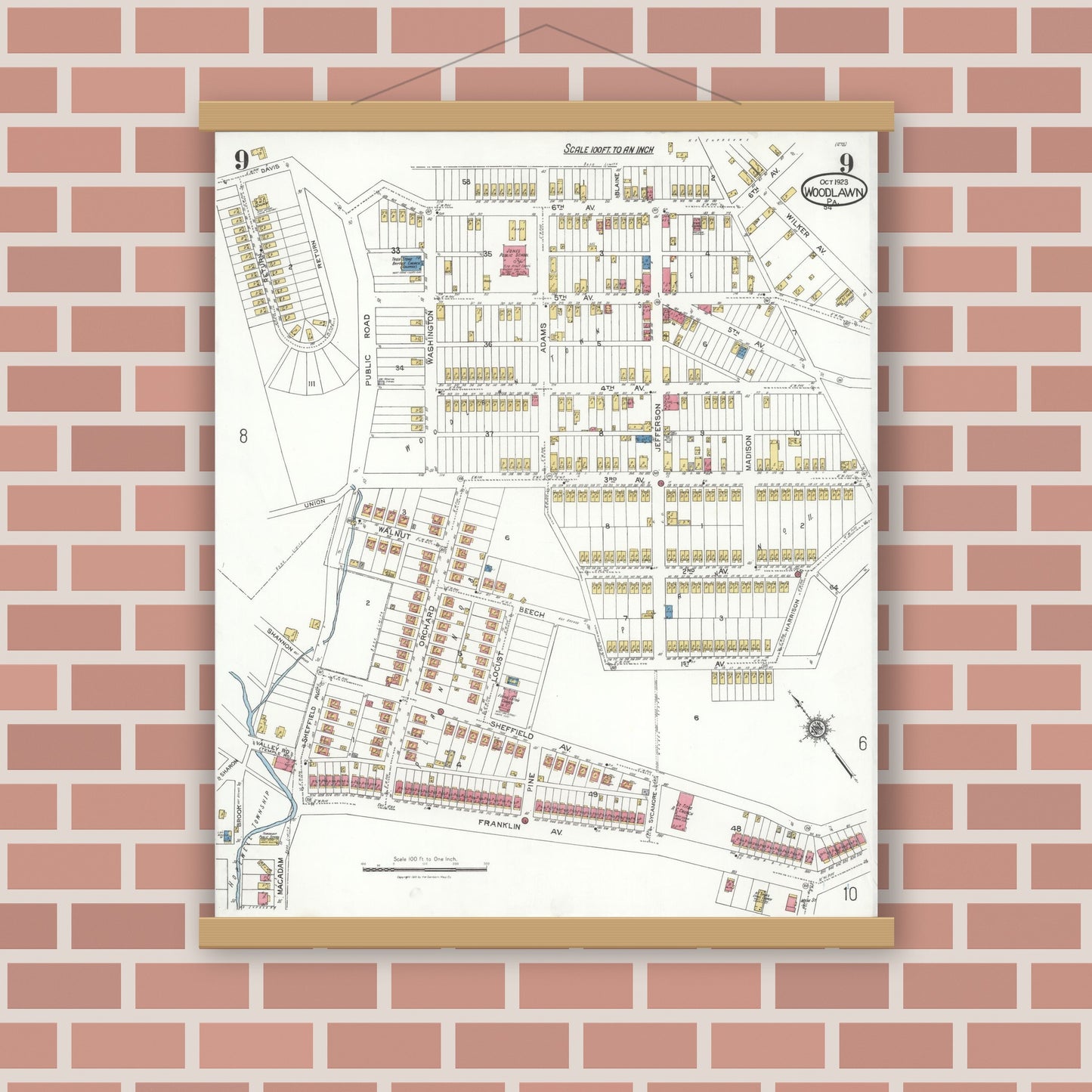 Old map wall art mockup — magnetic wood frame on brick wall — Sanborn Fire Insurance Map from Woodlawn, Beaver County, Pennsylvania (1923), Sheet #0009