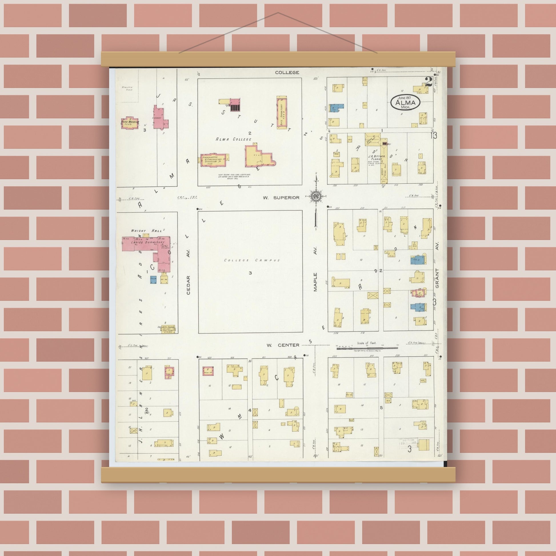 Old map wall art mockup — magnetic wood frame on brick wall — Sanborn Fire Insurance Map from Alma, Gratiot County, Michigan (1917), Sheet #0002