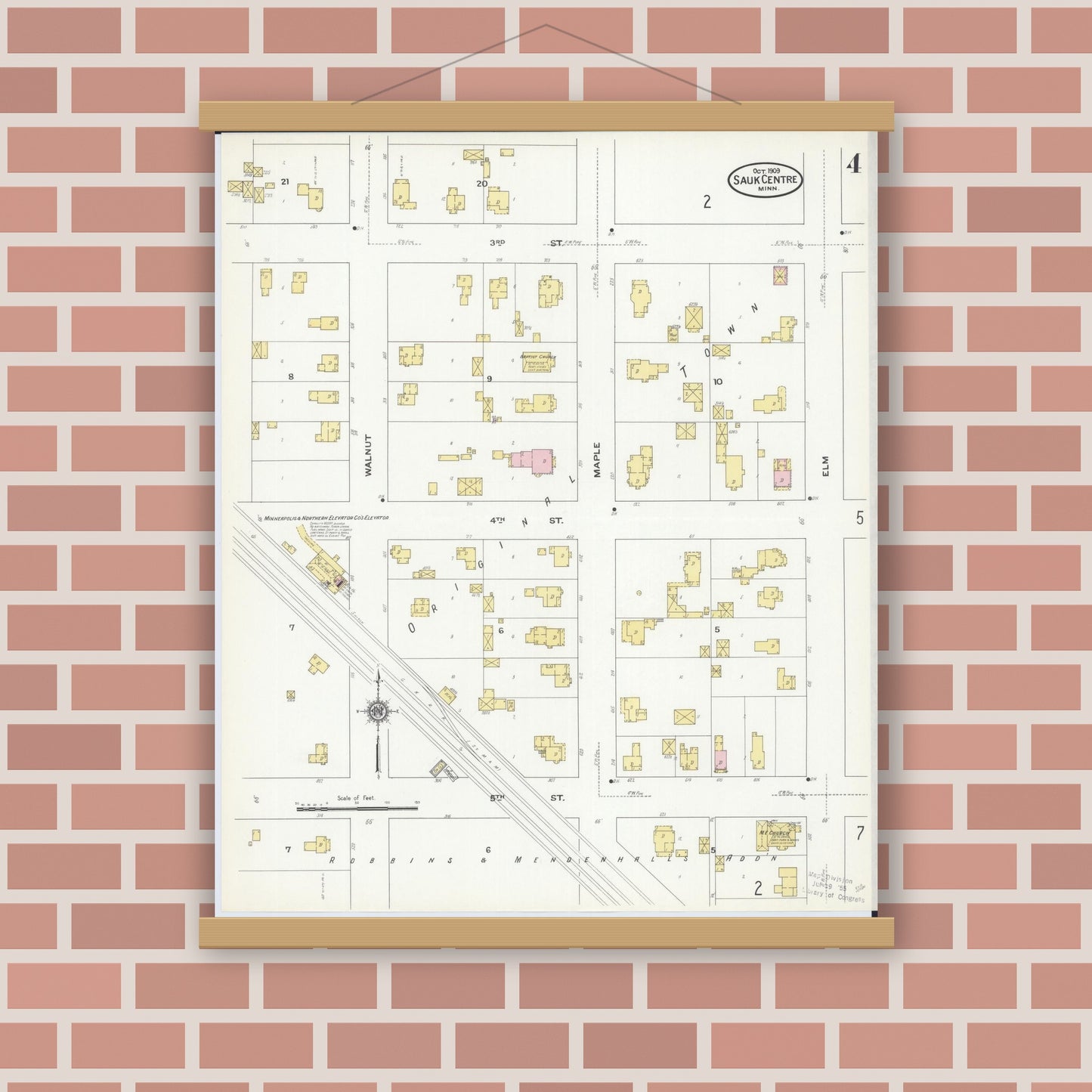 Old map wall art mockup — magnetic wood frame on brick wall — Sanborn Fire Insurance Map from Sauk Centre, Stearns County, Minnesota (1909), Sheet #0004