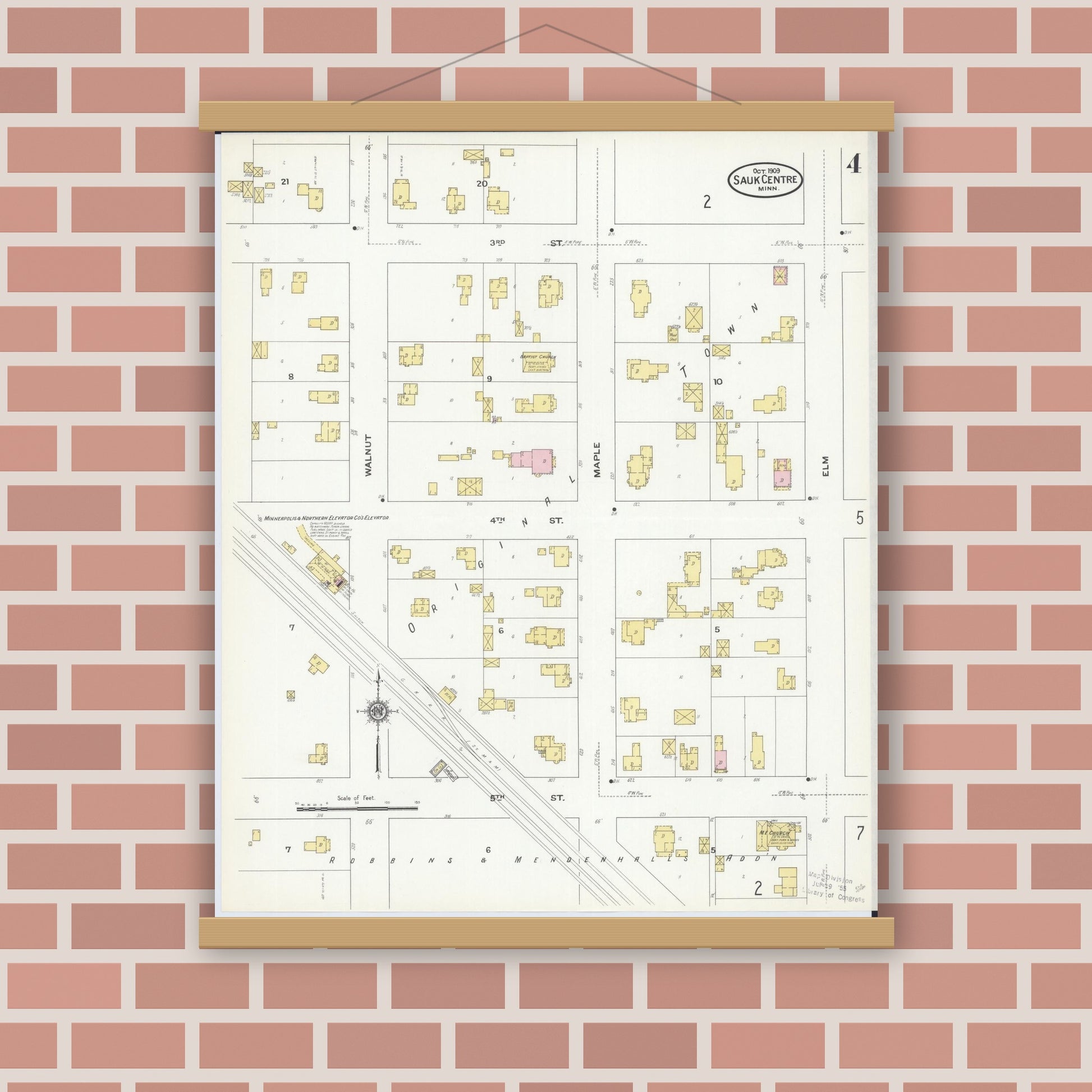 Old map wall art mockup — magnetic wood frame on brick wall — Sanborn Fire Insurance Map from Sauk Centre, Stearns County, Minnesota (1909), Sheet #0004