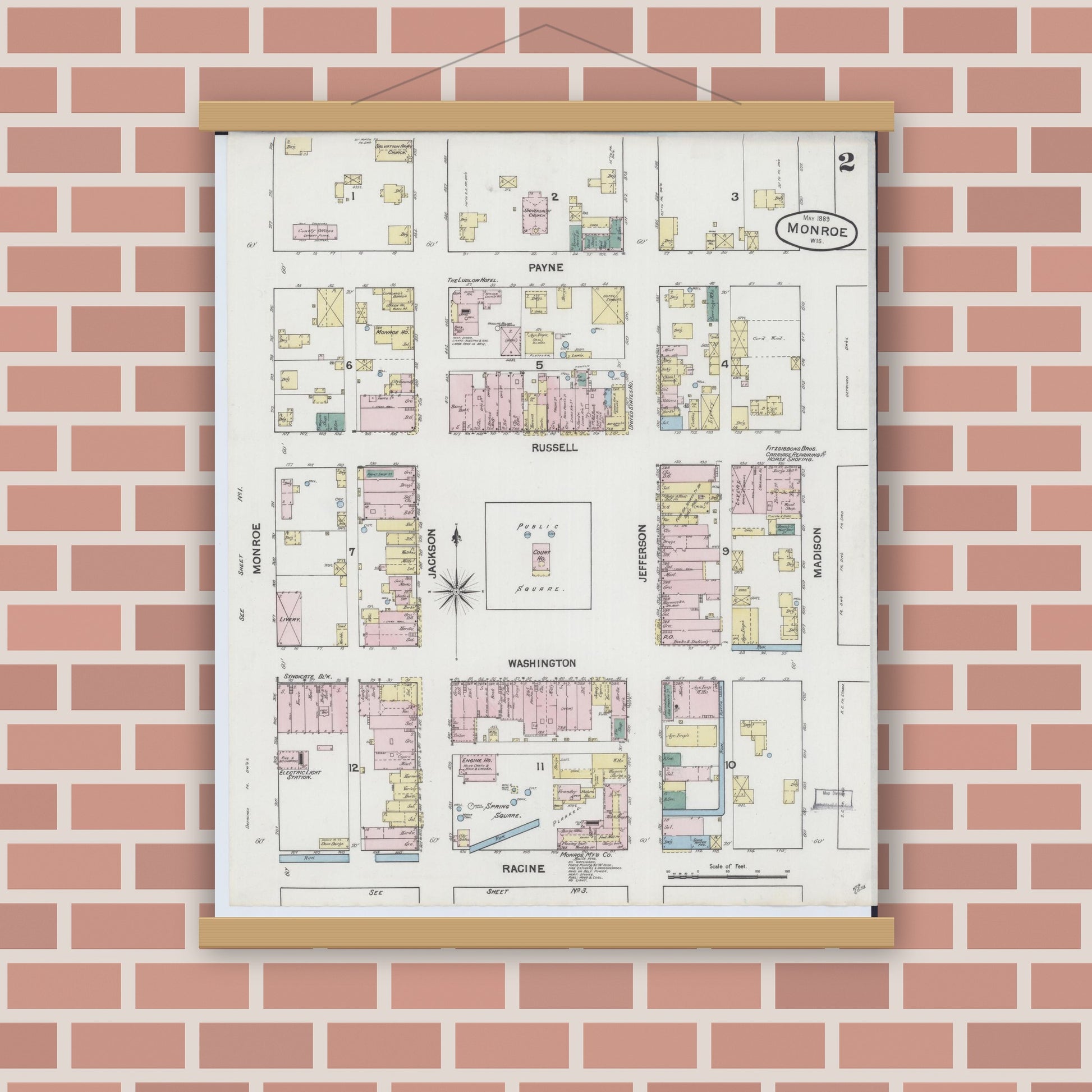 Old map wall art mockup — magnetic wood frame on brick wall — Sanborn Fire Insurance Map from Monroe, Green County, Wisconsin (1889), Sheet #0002