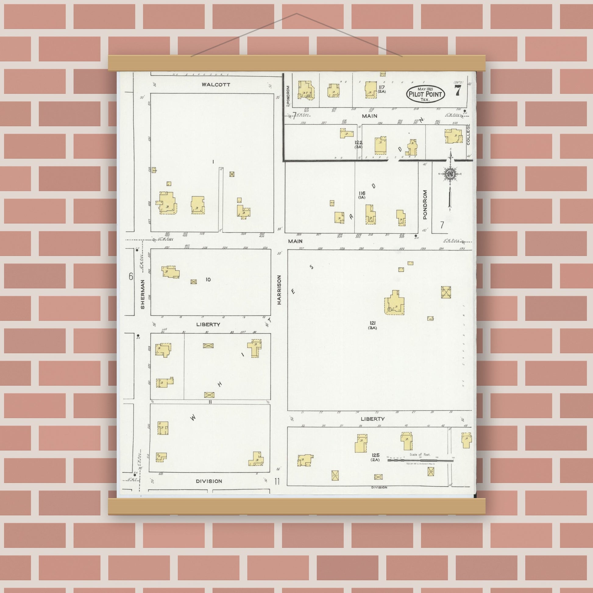 Old map wall art mockup — magnetic wood frame on brick wall — Sanborn Fire Insurance Map from Pilot Point, Denton County, Texas (1921), Sheet #0007