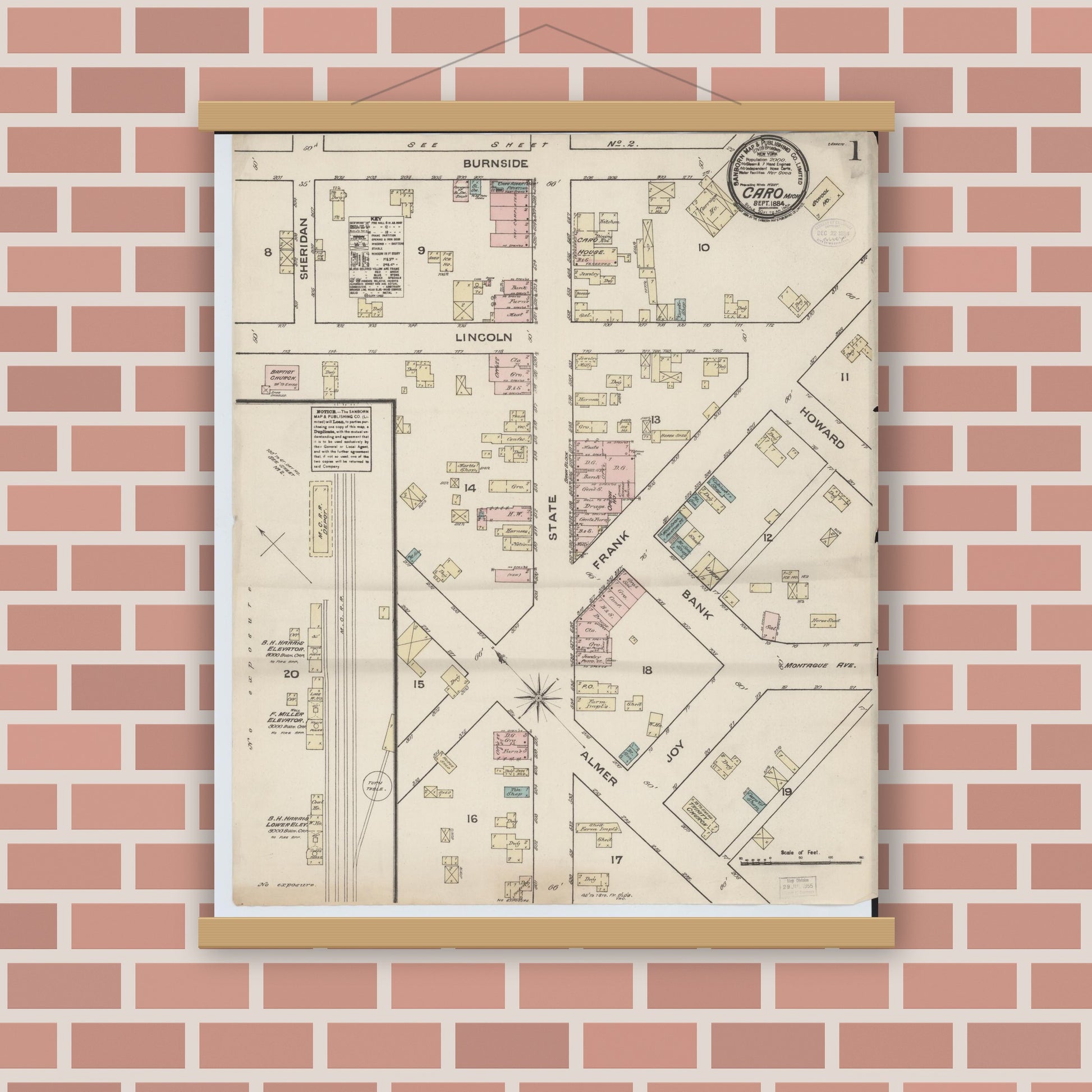 Old map wall art mockup — magnetic wood frame on brick wall — Sanborn Fire Insurance Map from Caro, Tuscola County, Michigan (1884), Sheet #0001