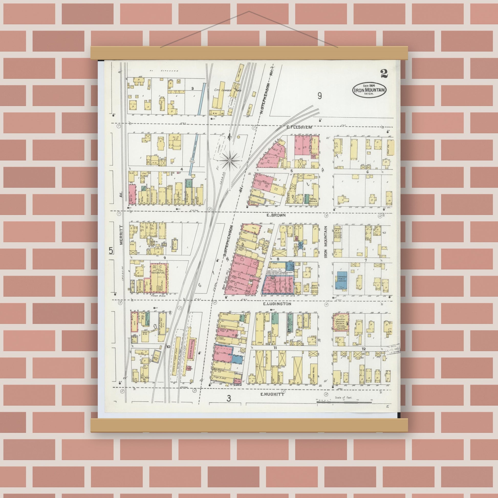 Old map wall art mockup — magnetic wood frame on brick wall — Sanborn Fire Insurance Map from Iron Mountain, Dickinson County, Michigan (1904), Sheet #0002