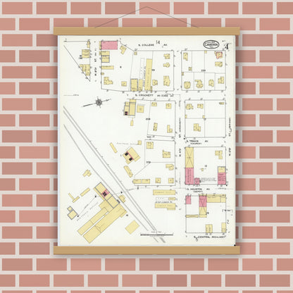 Old map wall art mockup — magnetic wood frame on brick wall — Sanborn Fire Insurance Map from Cameron, Milam County, Texas (1920), Sheet #0004