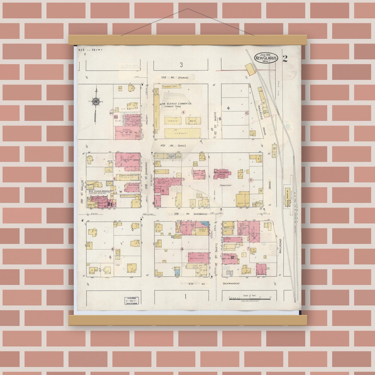 Old map wall art mockup — magnetic wood frame on brick wall — Sanborn Fire Insurance Map from New Glarus, Green County, Wisconsin (1933), Sheet #0002