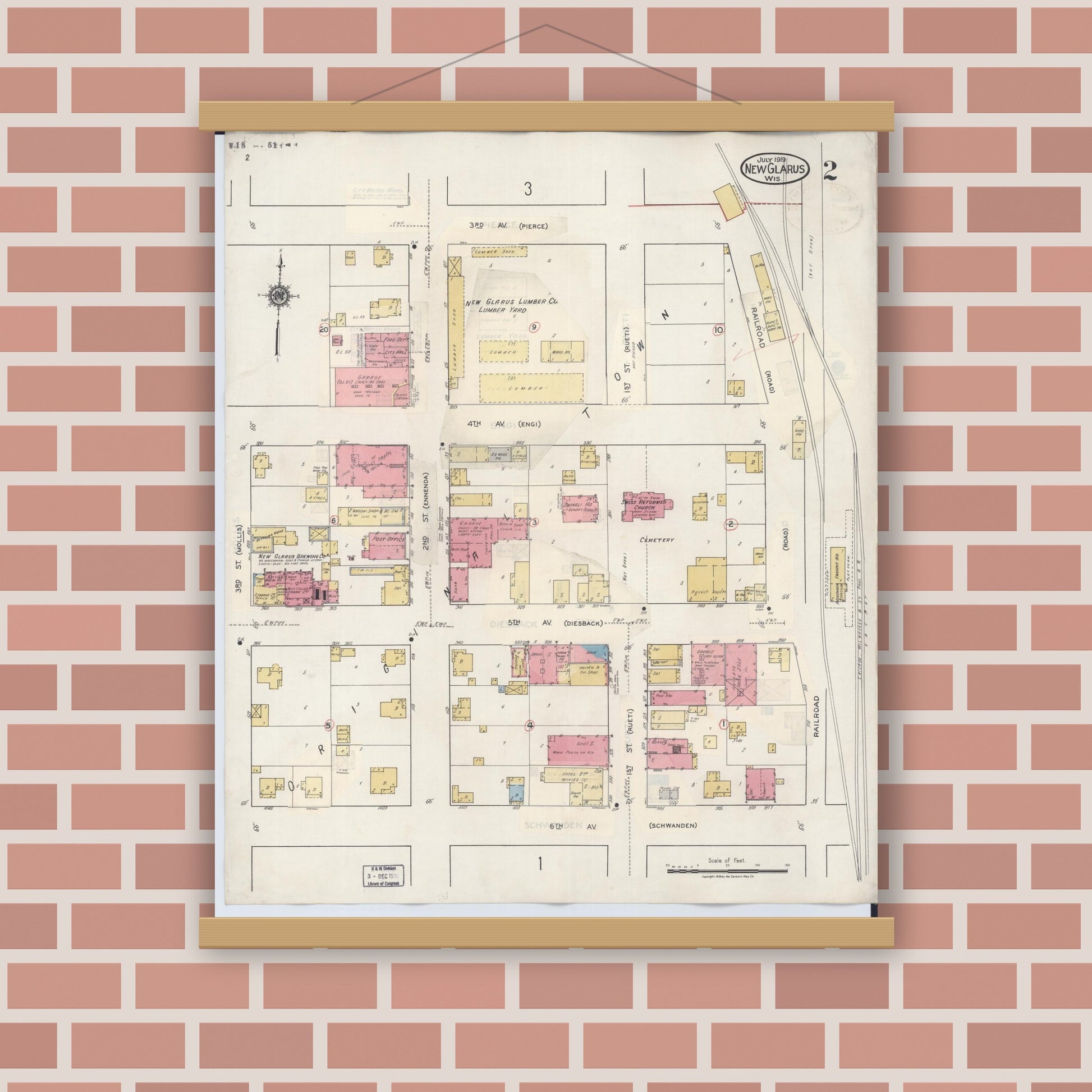 Old map wall art mockup — magnetic wood frame on brick wall — Sanborn Fire Insurance Map from New Glarus, Green County, Wisconsin (1933), Sheet #0002