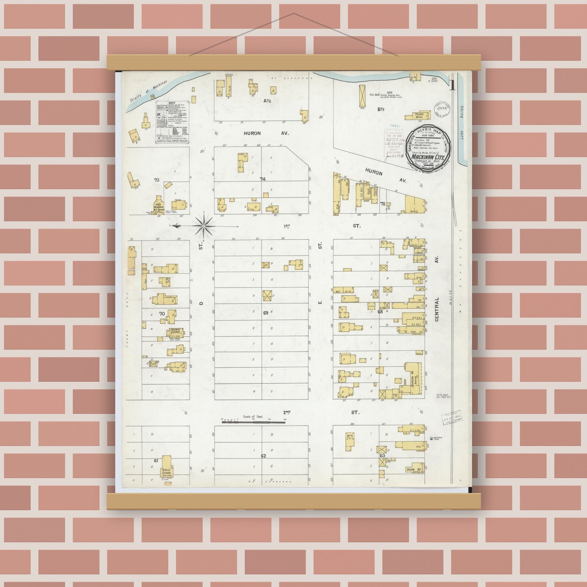 Old map wall art mockup — magnetic wood frame on brick wall — Sanborn Fire Insurance Map from Mackinaw City, Cheboygan County, Michigan (1900) - Complete Map Set