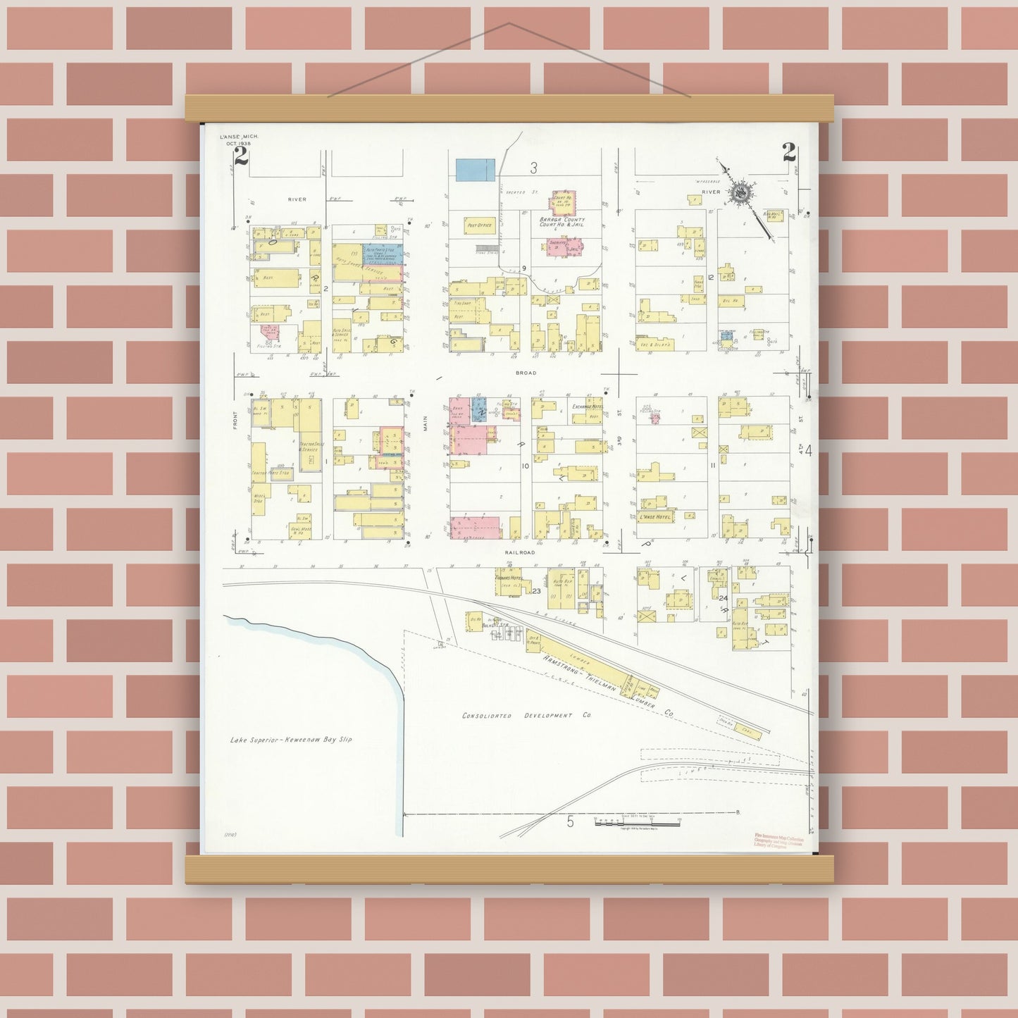 Old map wall art mockup — magnetic wood frame on brick wall — Sanborn Fire Insurance Map from L'Anse, Baraga County, Michigan (1938), Sheet #0002