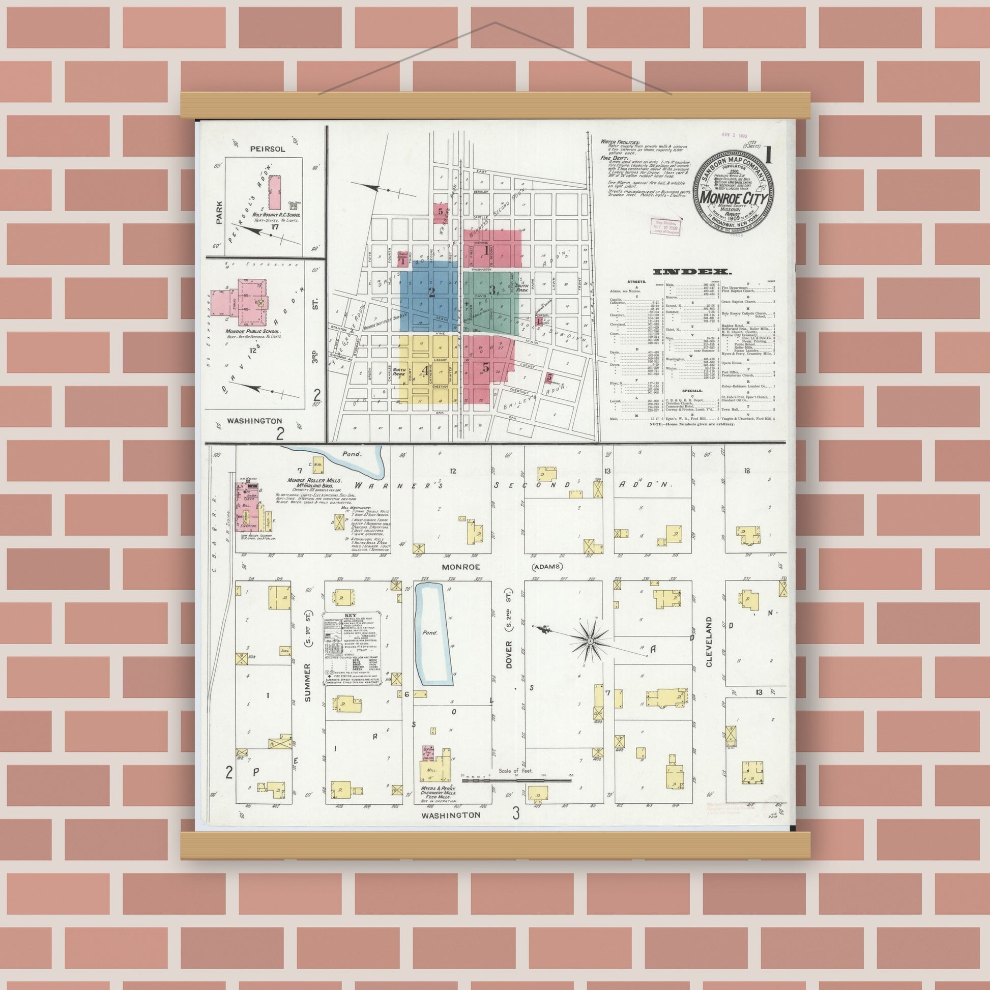 Old map wall art mockup — magnetic wood frame on brick wall — Sanborn Fire Insurance Map from Monroe City, Monroe County, Missouri (1909) - Complete Map Set