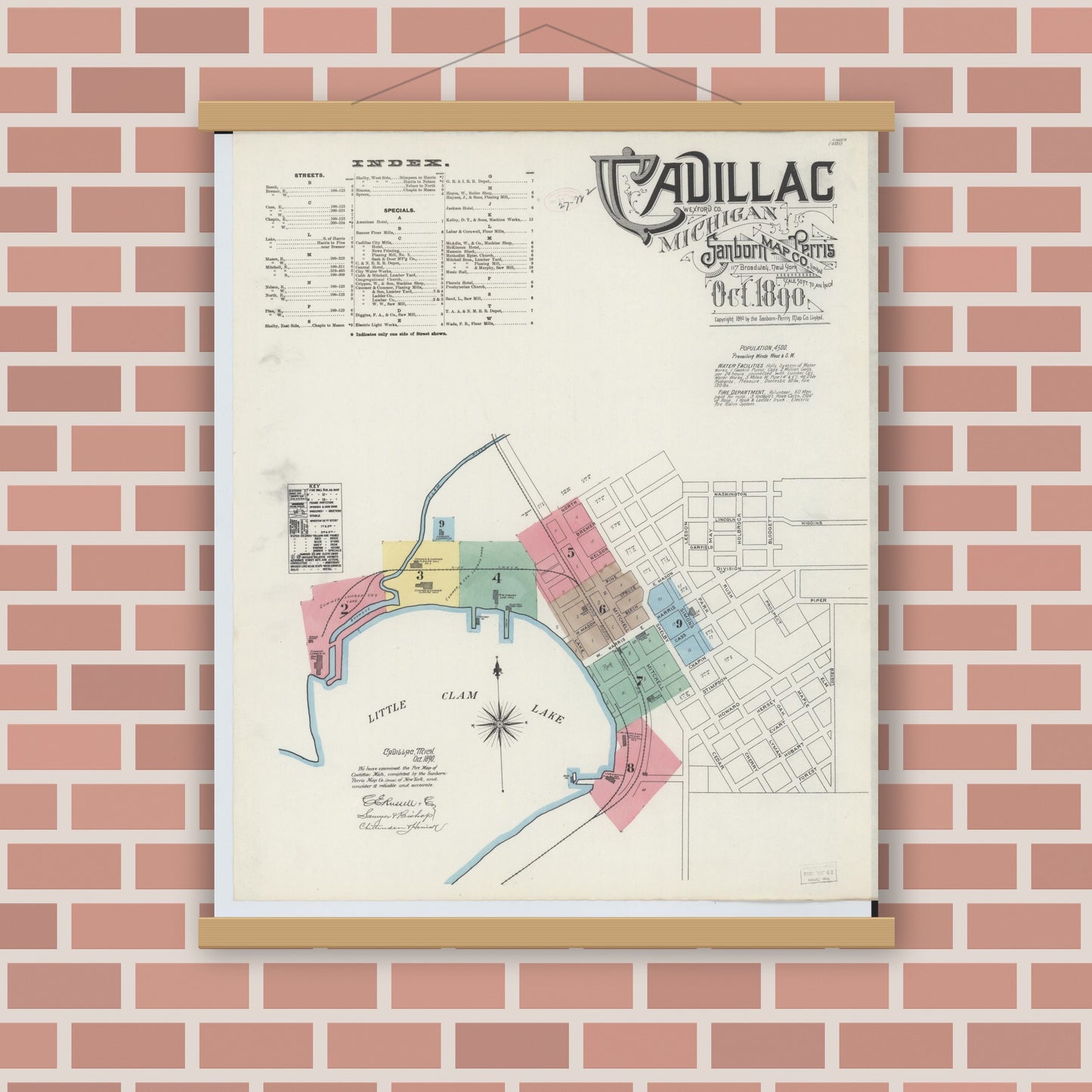 Old map wall art mockup — magnetic wood frame on brick wall — Sanborn Fire Insurance Map from Cadillac, Wexford County, Michigan (1890), Sheet #0001