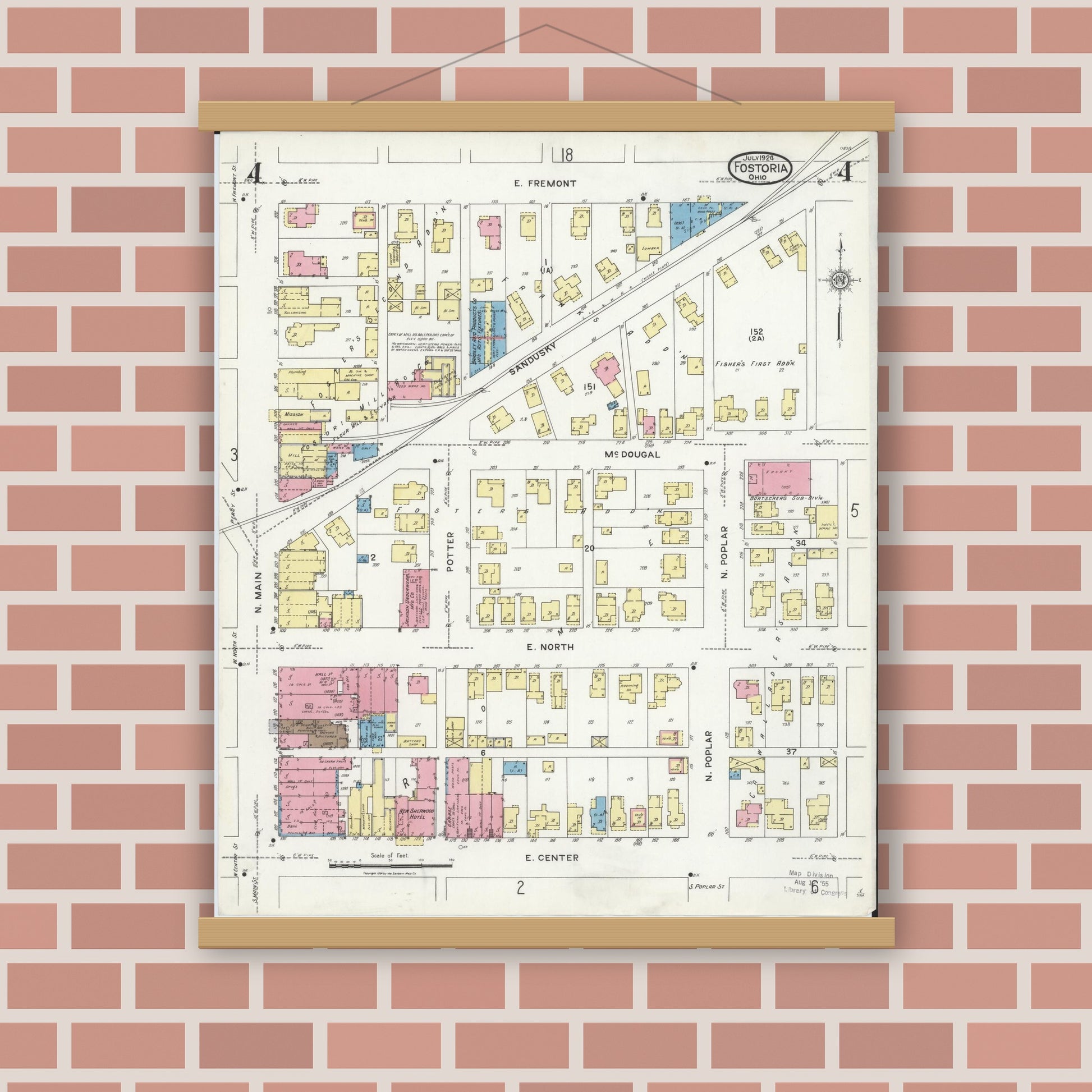 Old map wall art mockup — magnetic wood frame on brick wall — Sanborn Fire Insurance Map from Fostoria, Seneca, Hancock, And Wood Counties, Ohio (1924), Sheet #0004