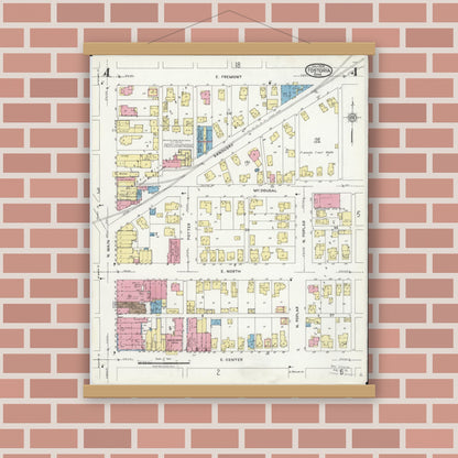 Old map wall art mockup — magnetic wood frame on brick wall — Sanborn Fire Insurance Map from Fostoria, Seneca, Hancock, And Wood Counties, Ohio (1924), Sheet #0004