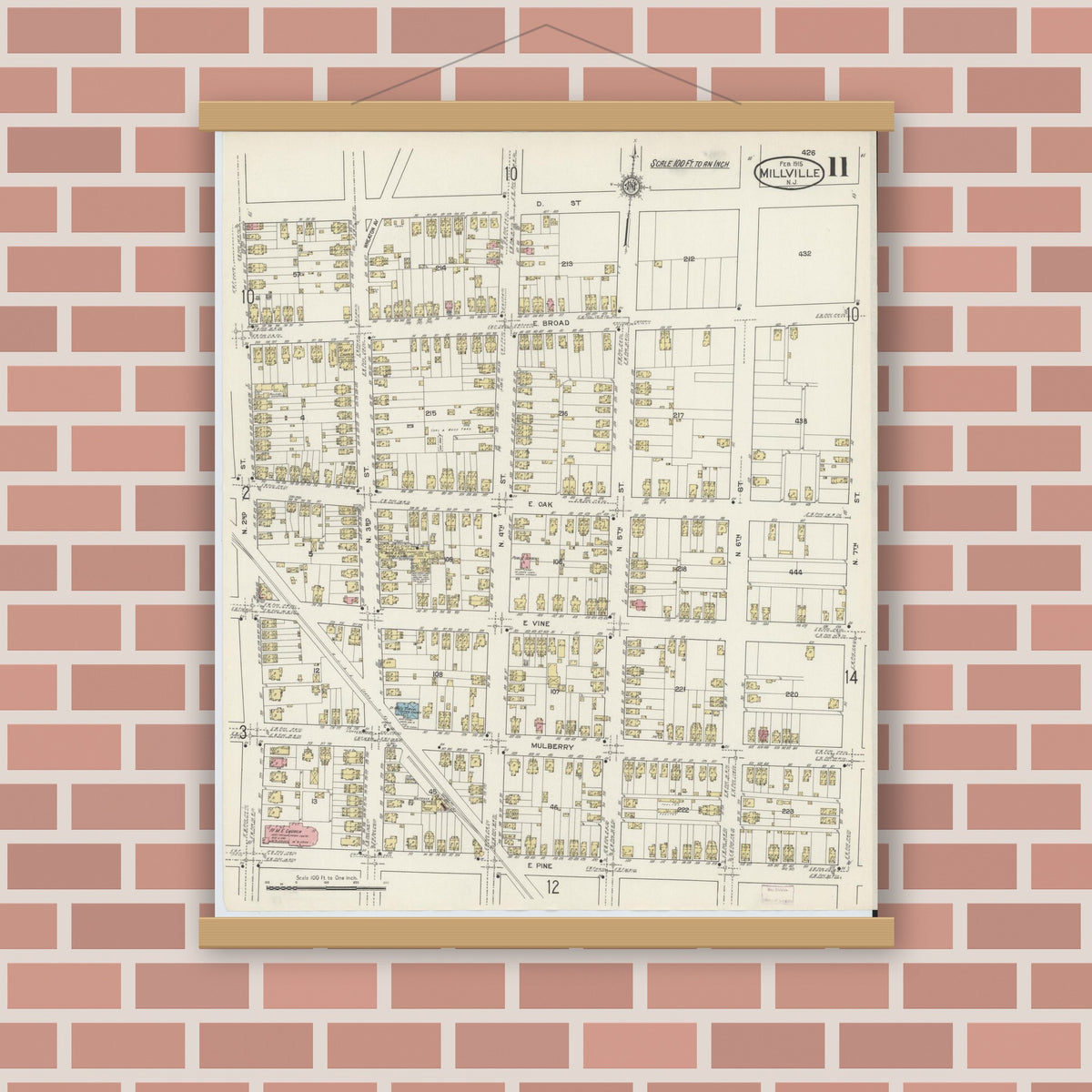 Old map wall art mockup — magnetic wood frame on brick wall — Sanborn Fire Insurance Map from Millville, Cumberland County, New Jersey (1915), Sheet #0011