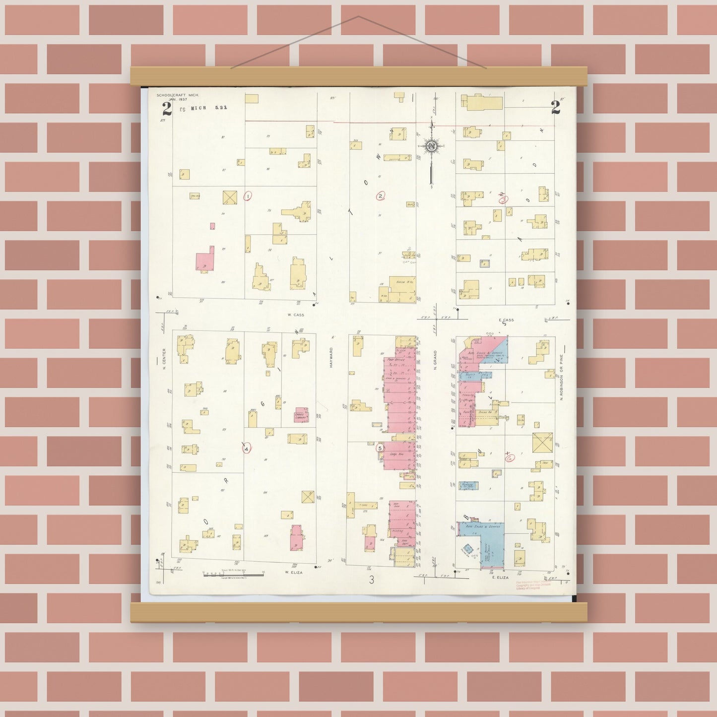 Old map wall art mockup — magnetic wood frame on brick wall — Sanborn Fire Insurance Map from Schoolcraft, Kalamazoo County, Michigan (1937), Sheet #0002
