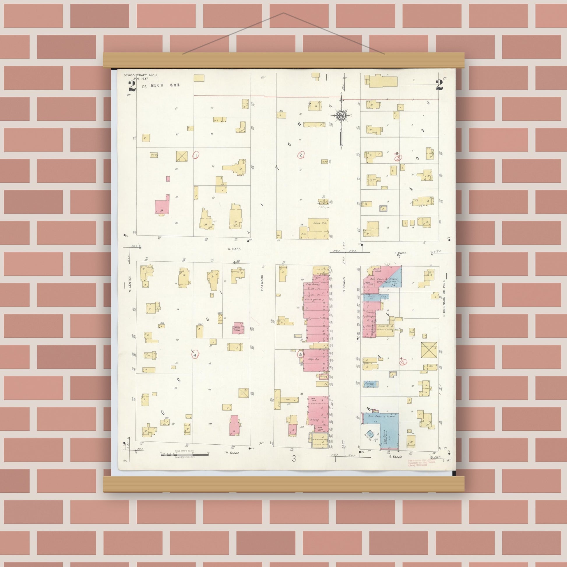 Old map wall art mockup — magnetic wood frame on brick wall — Sanborn Fire Insurance Map from Schoolcraft, Kalamazoo County, Michigan (1937), Sheet #0002