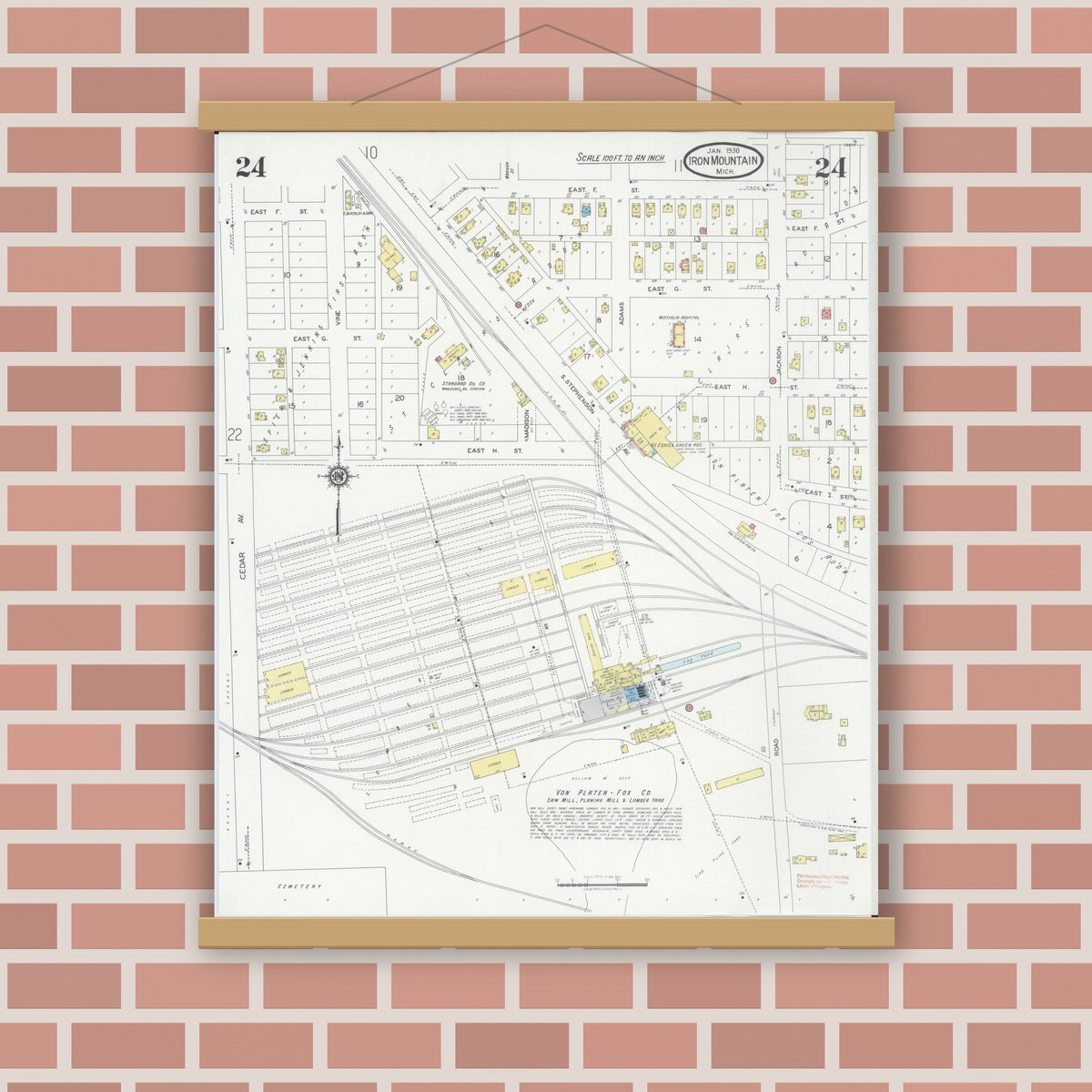 Old map wall art mockup — magnetic wood frame on brick wall — Sanborn Fire Insurance Map from Iron Mountain, Dickinson County, Michigan (1930), Sheet #0024