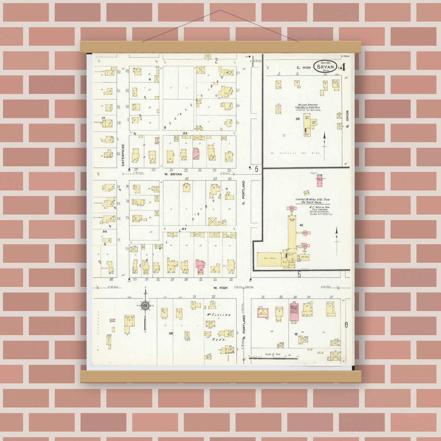 Old map wall art mockup — magnetic wood frame on brick wall — Sanborn Fire Insurance Map from Bryan, Williams County, Ohio (1911), Sheet #0004