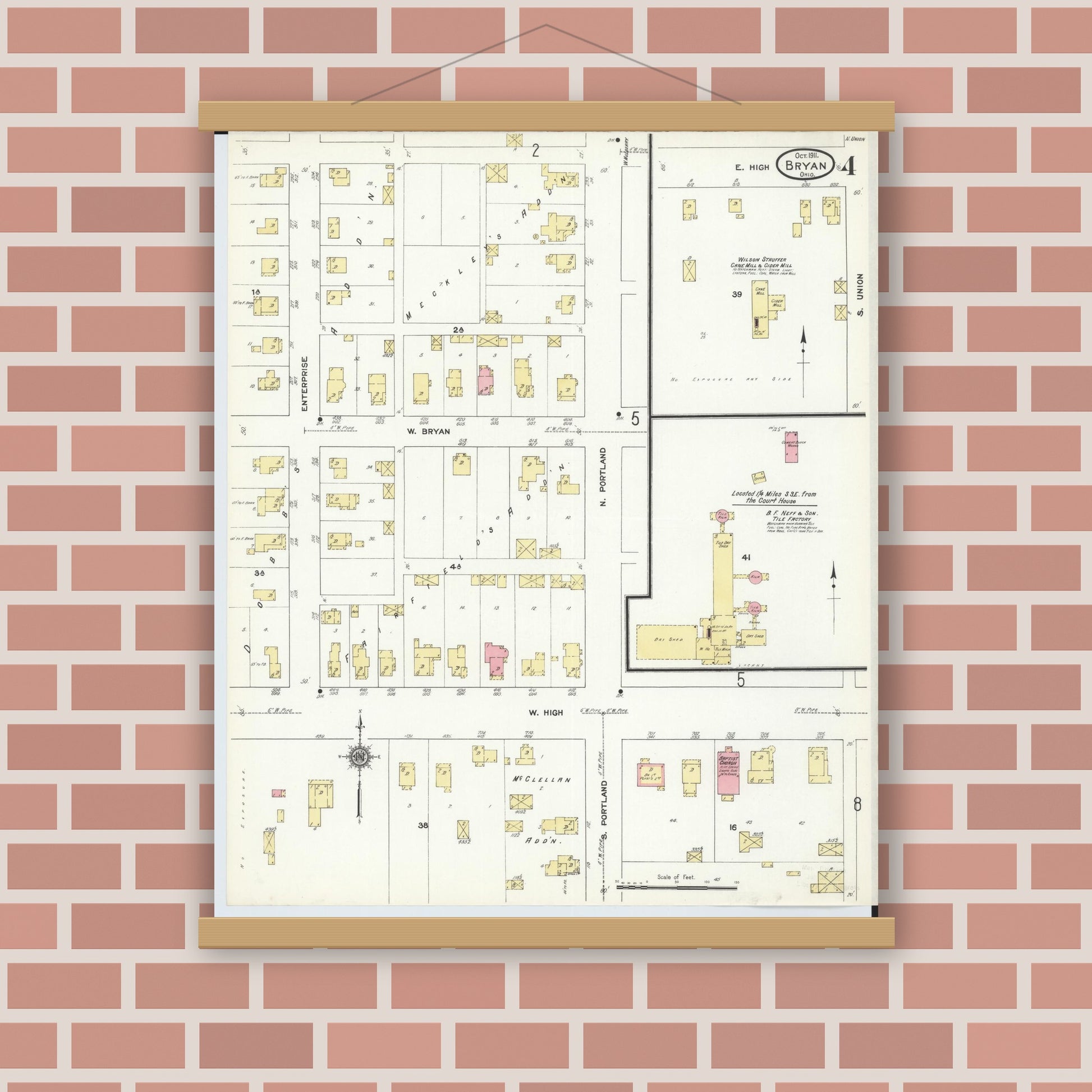 Old map wall art mockup — magnetic wood frame on brick wall — Sanborn Fire Insurance Map from Bryan, Williams County, Ohio (1911), Sheet #0004