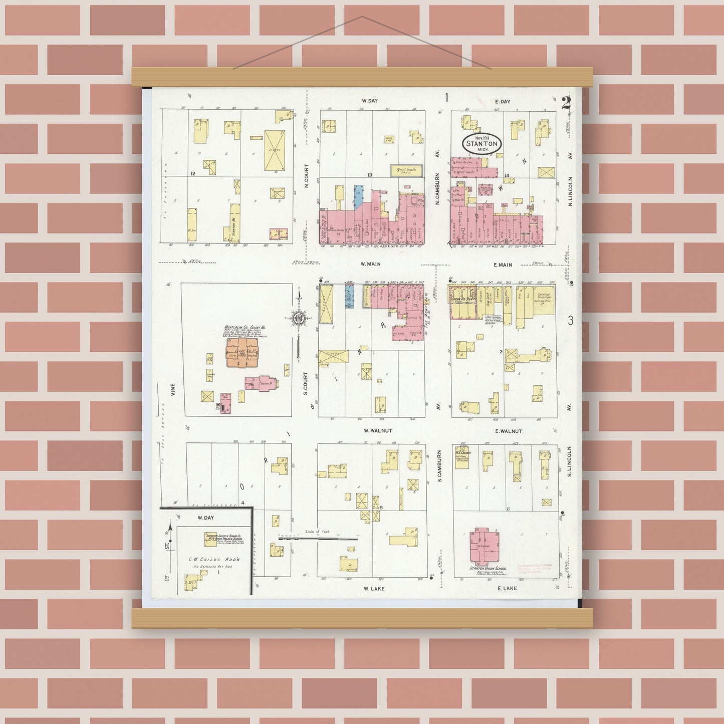 Old map wall art mockup — magnetic wood frame on brick wall — Sanborn Fire Insurance Map from Stanton, Montcalm County, Michigan (1911), Sheet #0002