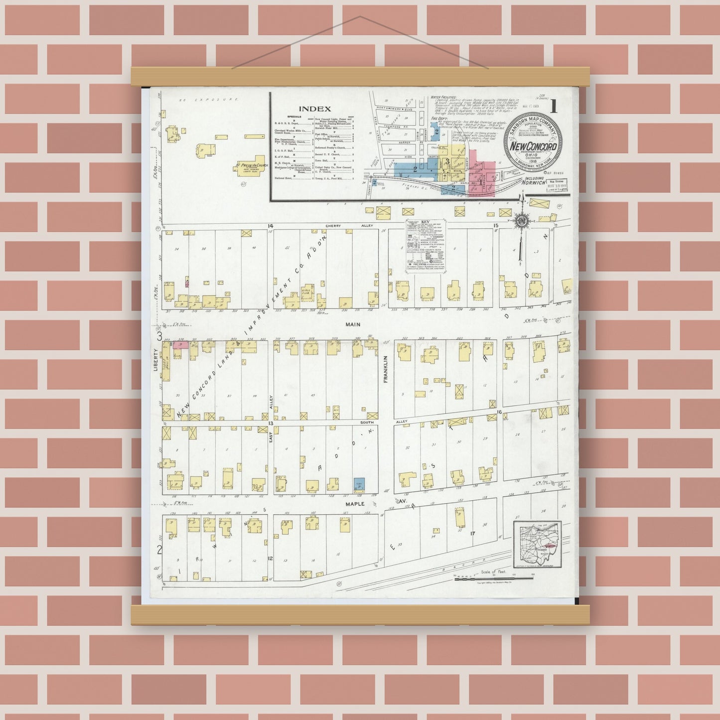 Old map wall art mockup — magnetic wood frame on brick wall — Sanborn Fire Insurance Map from New Concord, Muskingum County, Ohio (1918) - Complete Map Set