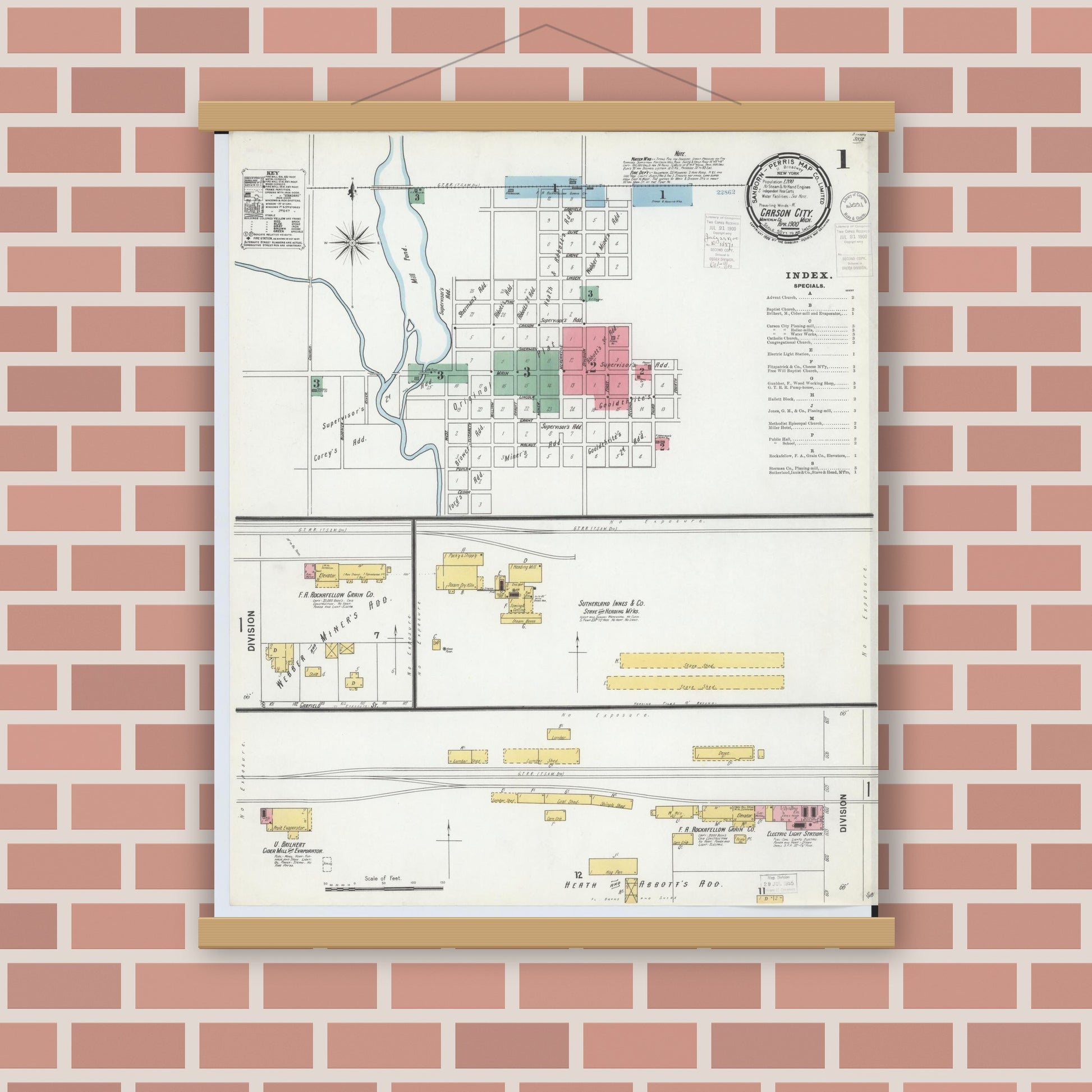 Old map wall art mockup — magnetic wood frame on brick wall — Sanborn Fire Insurance Map from Carson City, Montcalm County, Michigan (1900) - Complete Map Set