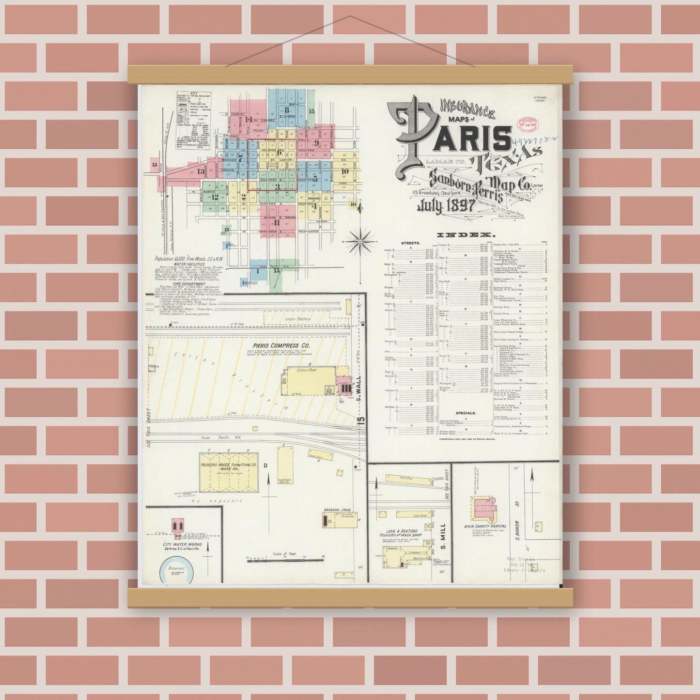 Old map wall art mockup — magnetic wood frame on brick wall — Sanborn Fire Insurance Map from Paris, Lamar County, Texas (1897), Sheet #0001