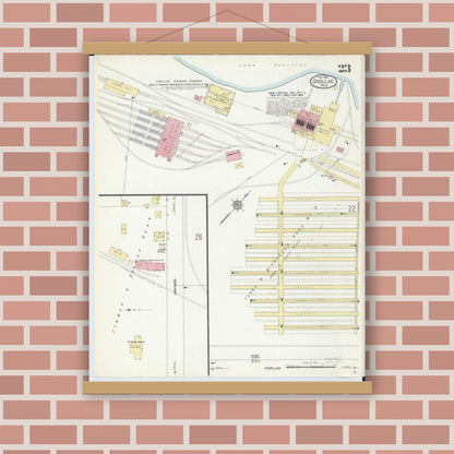 Old map wall art mockup — magnetic wood frame on brick wall — Sanborn Fire Insurance Map from Cadillac, Wexford County, Michigan (1914), Sheet #0023