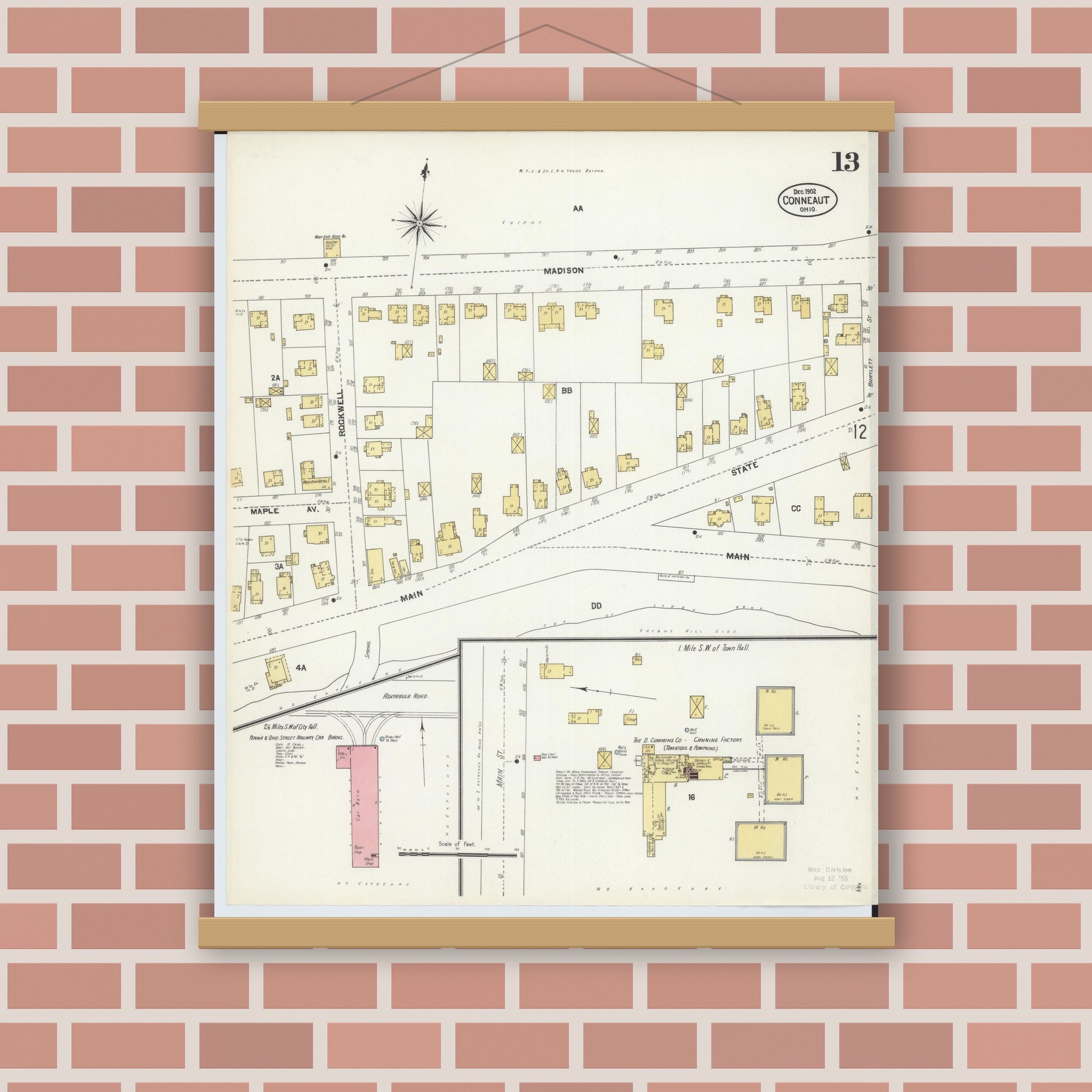 Old map wall art mockup — magnetic wood frame on brick wall — Sanborn Fire Insurance Map from Conneaut, Ashtabula County, Ohio (1902), Sheet #0013