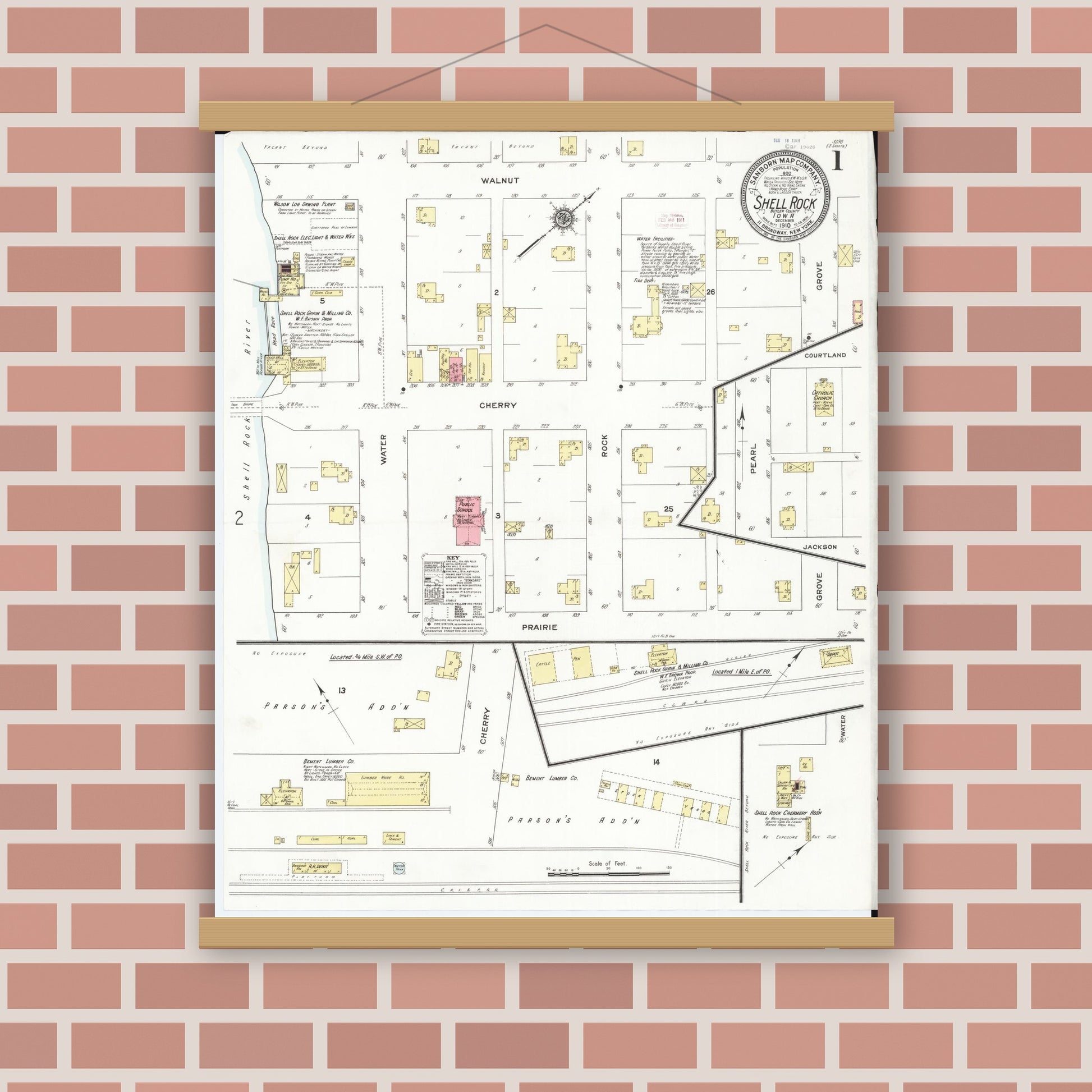 Old map wall art mockup — magnetic wood frame on brick wall — Sanborn Fire Insurance Map from Shell Rock, Butler County, Iowa (1910), Sheet #0001