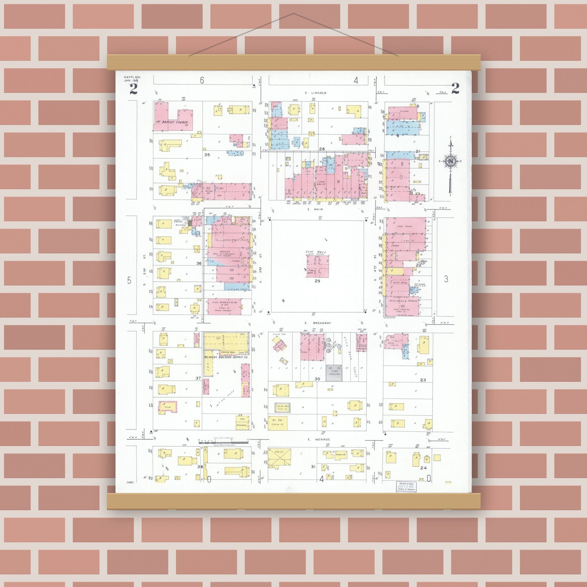 Old map wall art mockup — magnetic wood frame on brick wall — Sanborn Fire Insurance Map from Hayti, Pemiscot County, Missouri (1951), Sheet #0002