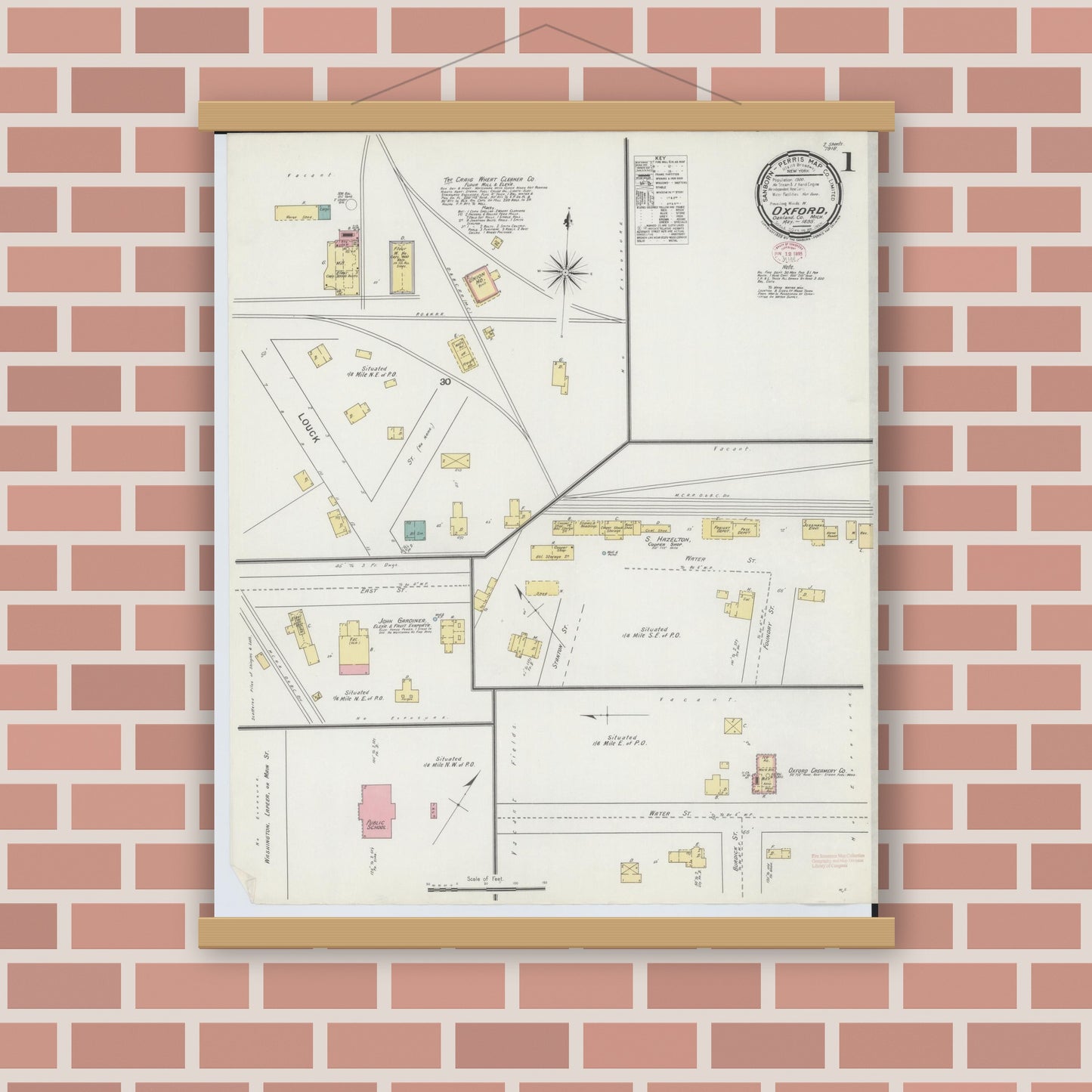 Old map wall art mockup — magnetic wood frame on brick wall — Sanborn Fire Insurance Map from Oxford, Oakland County, Michigan (1895) - Complete Map Set