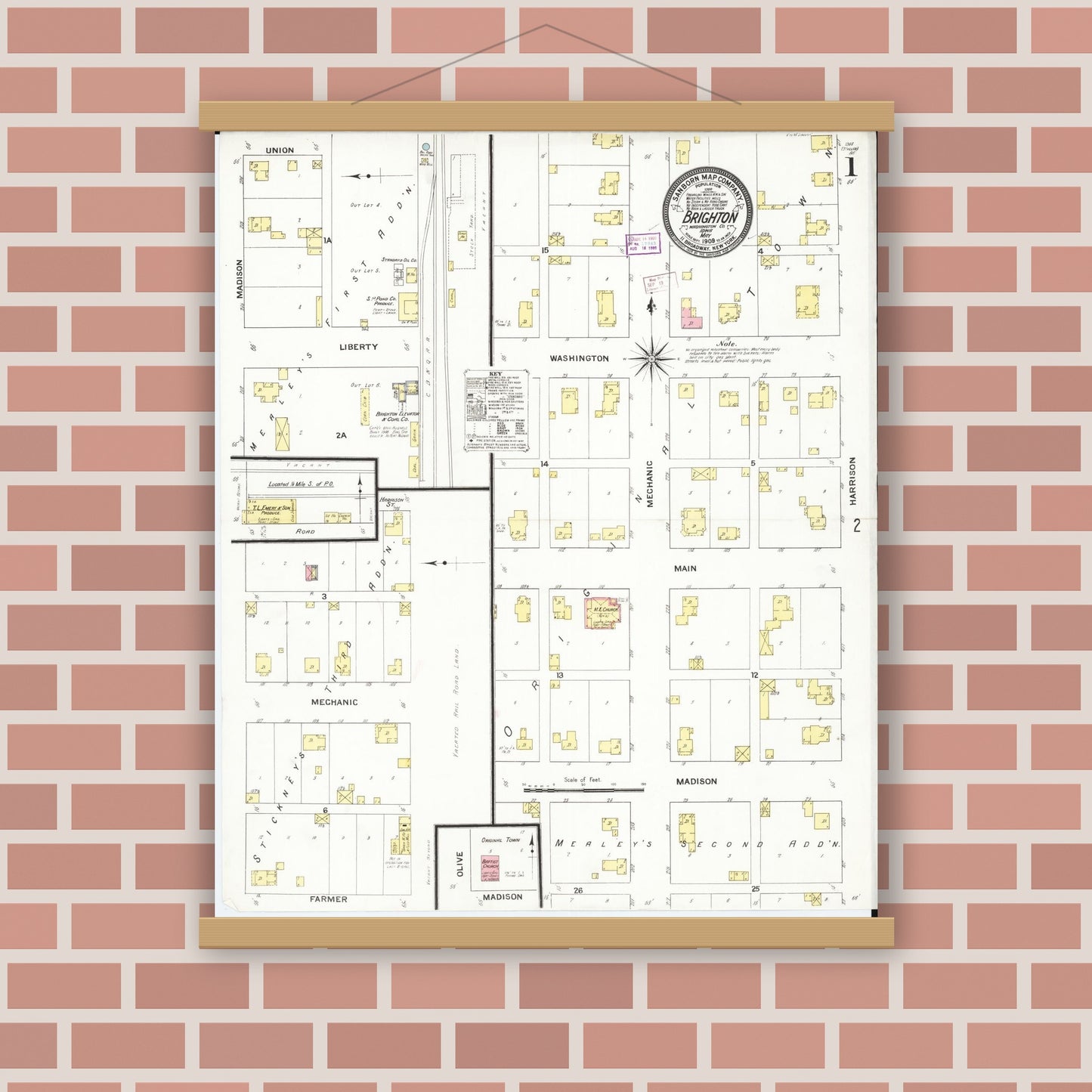 Old map wall art mockup — magnetic wood frame on brick wall — Sanborn Fire Insurance Map from Brighton, Washington County, Iowa (1909) â€” Complete Set