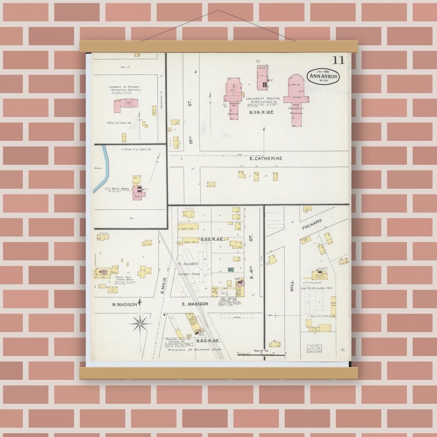 Old map wall art mockup — magnetic wood frame on brick wall — Sanborn Fire Insurance Map from Ann Arbor, Washtenaw County, Michigan (1892), Sheet #0011