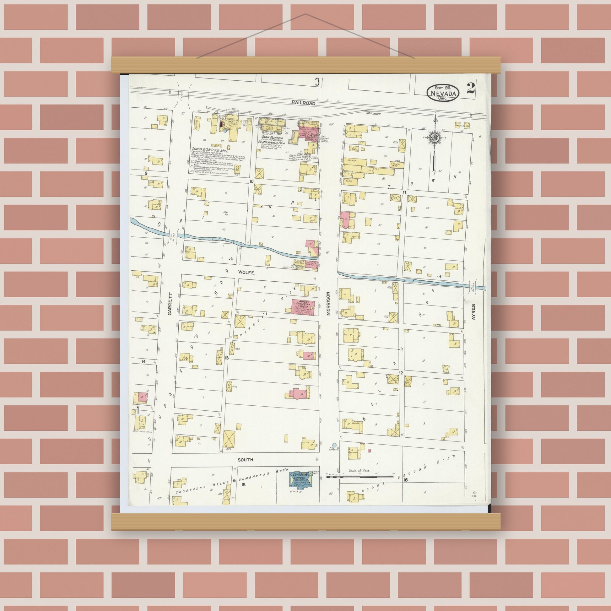 Old map wall art mockup — magnetic wood frame on brick wall — Sanborn Fire Insurance Map from Nevada, Wyandot County, Ohio (1911), Sheet #0002