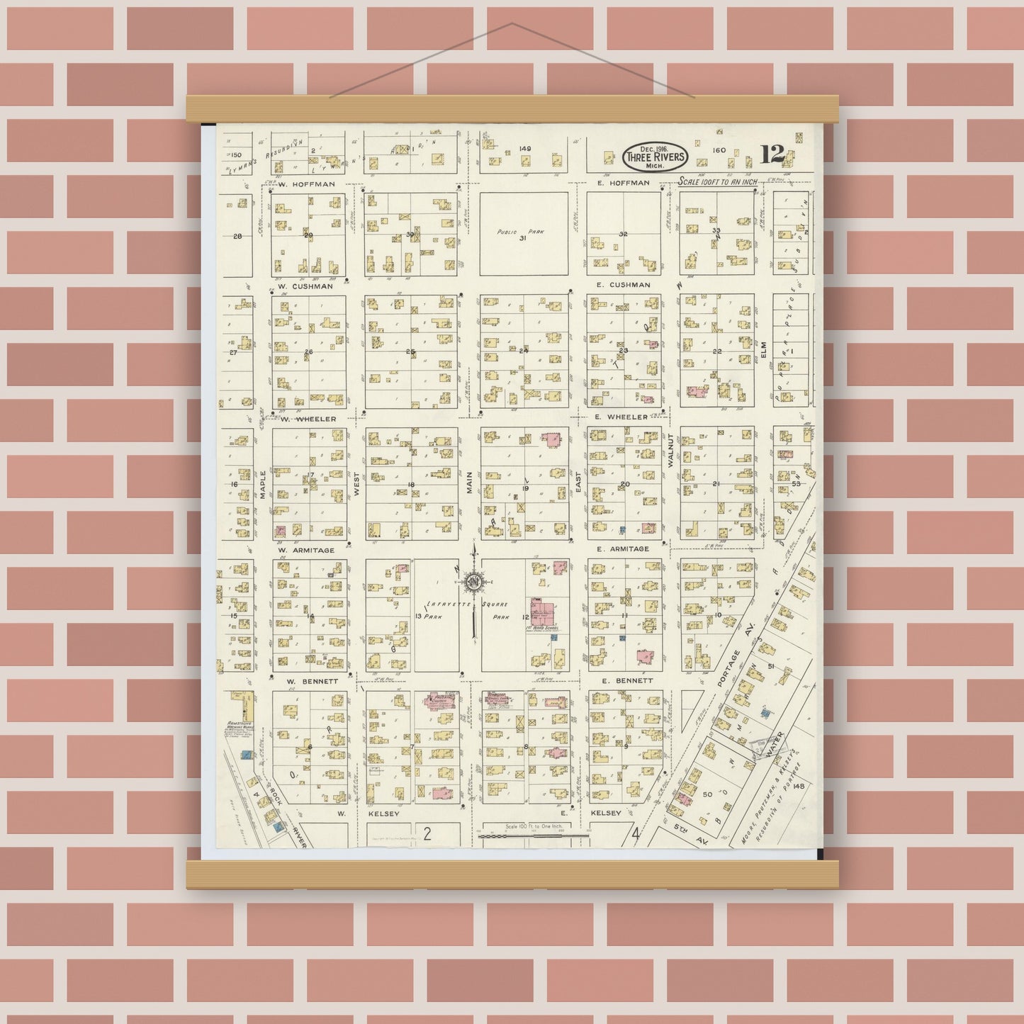 Old map wall art mockup — magnetic wood frame on brick wall — Sanborn Fire Insurance Map from Three Rivers, Saint Joseph County, Michigan (1916), Sheet #0012