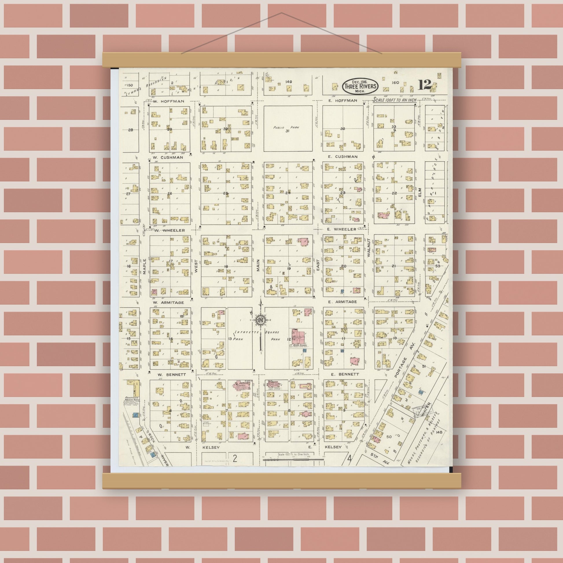 Old map wall art mockup — magnetic wood frame on brick wall — Sanborn Fire Insurance Map from Three Rivers, Saint Joseph County, Michigan (1916), Sheet #0012