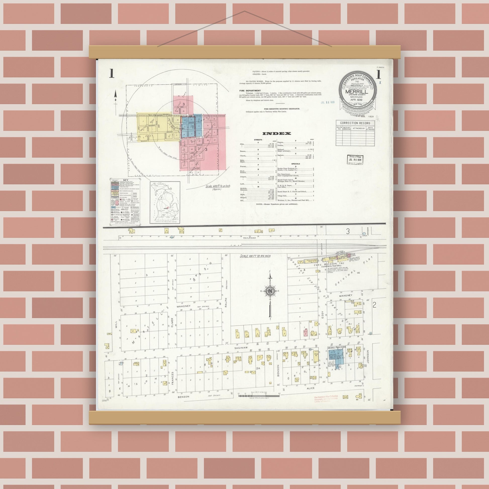 Old map wall art mockup — magnetic wood frame on brick wall — Sanborn Fire Insurance Map from Merrill, Saginaw County, Michigan (1939) - Complete Map Set
