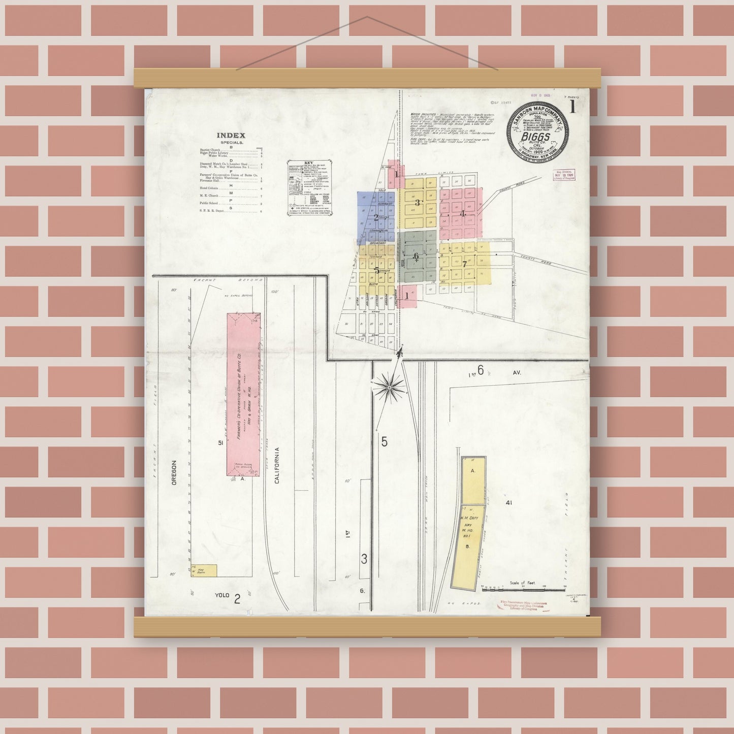 Old map wall art mockup — magnetic wood frame on brick wall — Sanborn Fire Insurance Map from Biggs, Butte County, California (1909), Sheet #0001