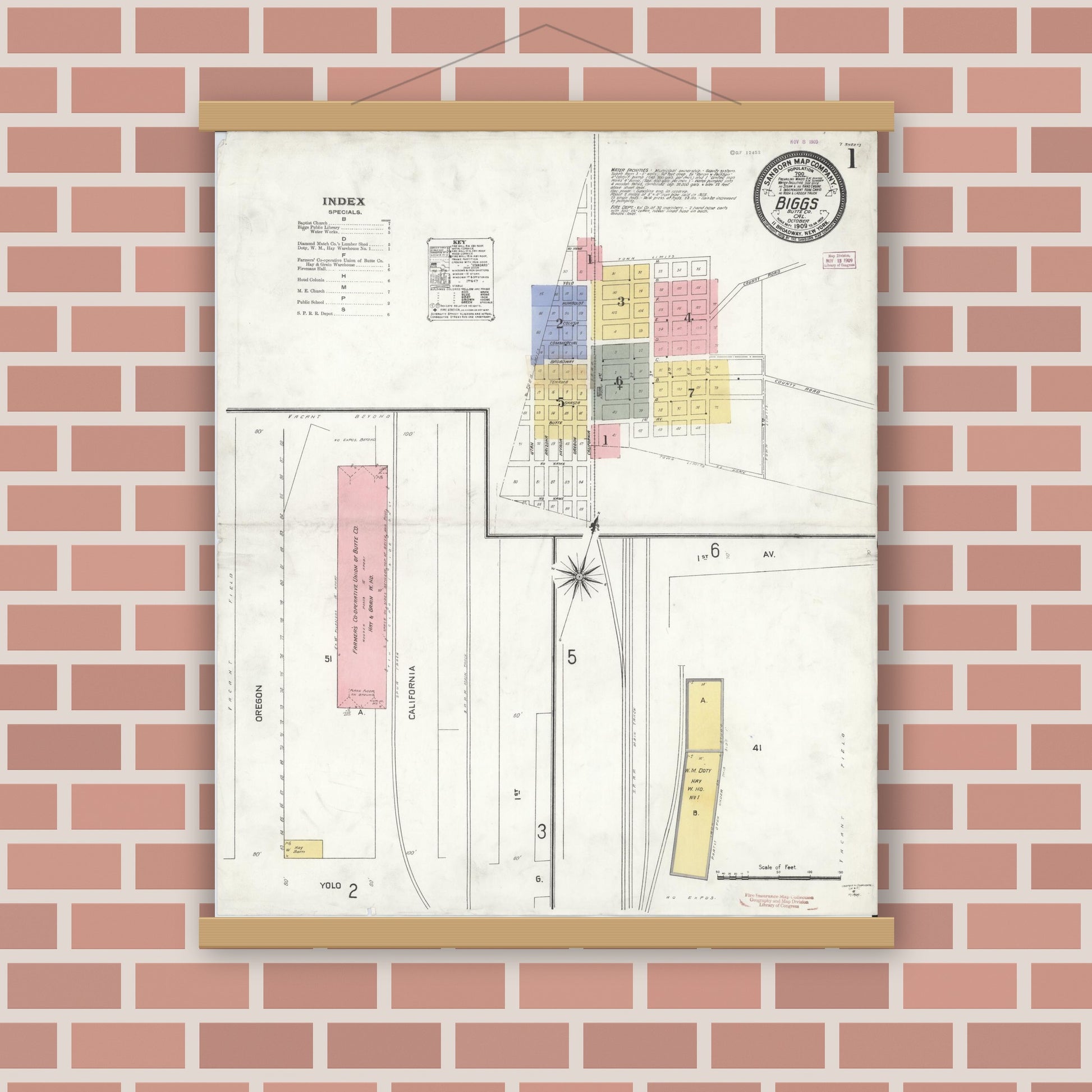 Old map wall art mockup — magnetic wood frame on brick wall — Sanborn Fire Insurance Map from Biggs, Butte County, California (1909), Sheet #0001