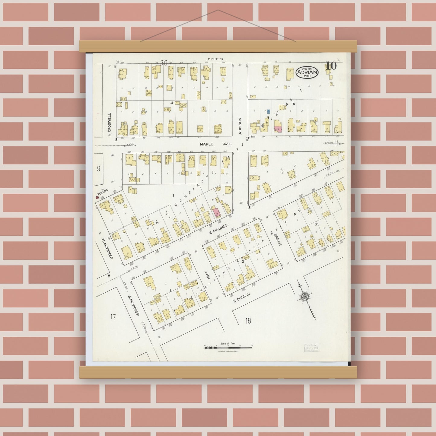 Old map wall art mockup — magnetic wood frame on brick wall — Sanborn Fire Insurance Map from Adrian, Lenawee County, Michigan (1916), Sheet #0010