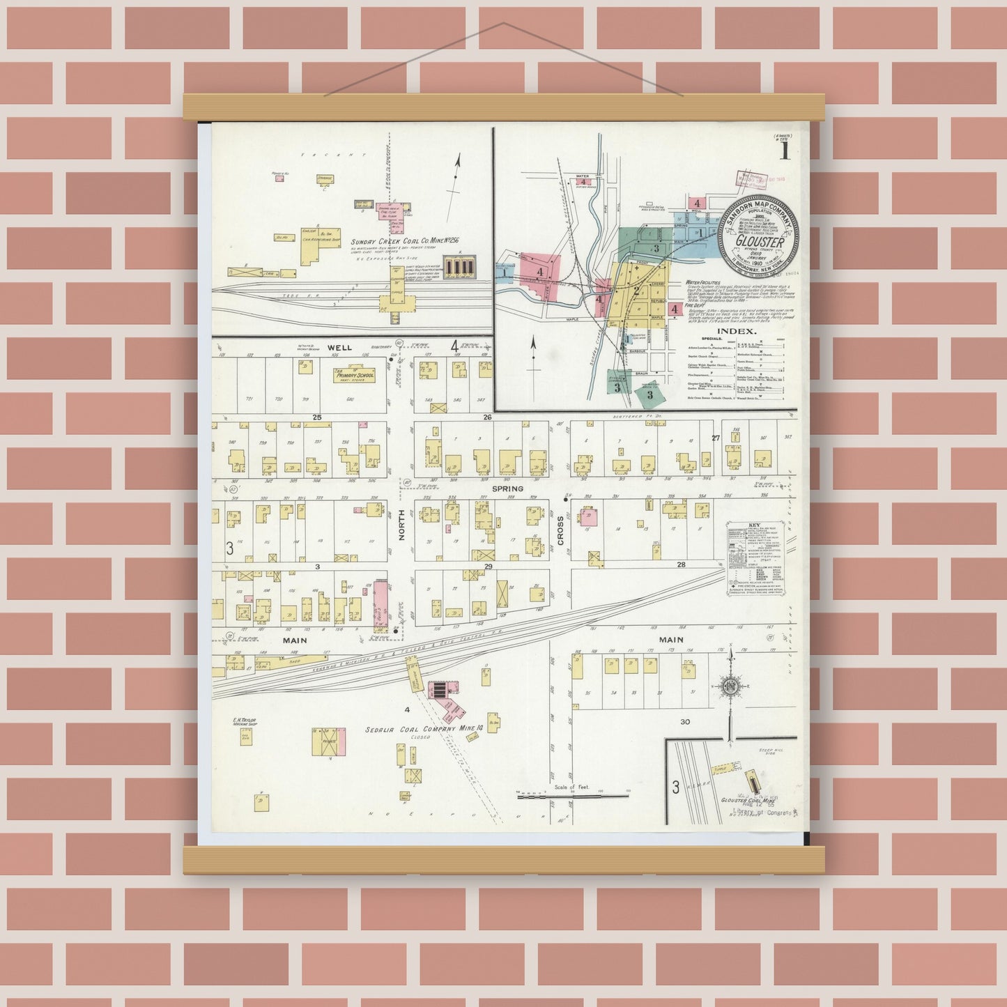 Old map wall art mockup — magnetic wood frame on brick wall — Sanborn Fire Insurance Map from Glouster, Athens County, Ohio (1910), Sheet #0001