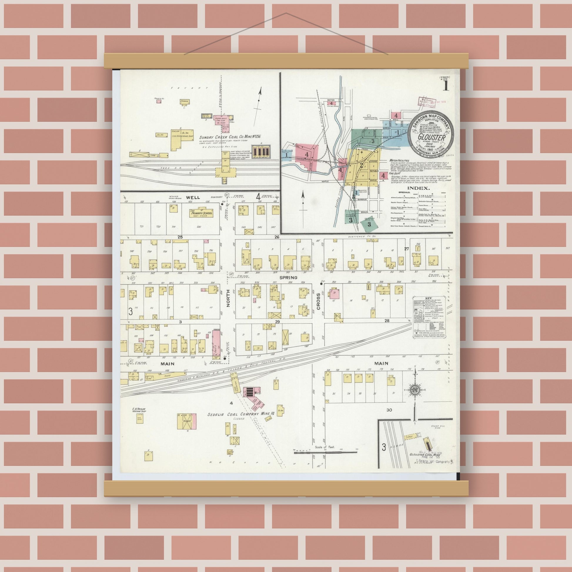 Old map wall art mockup — magnetic wood frame on brick wall — Sanborn Fire Insurance Map from Glouster, Athens County, Ohio (1910), Sheet #0001