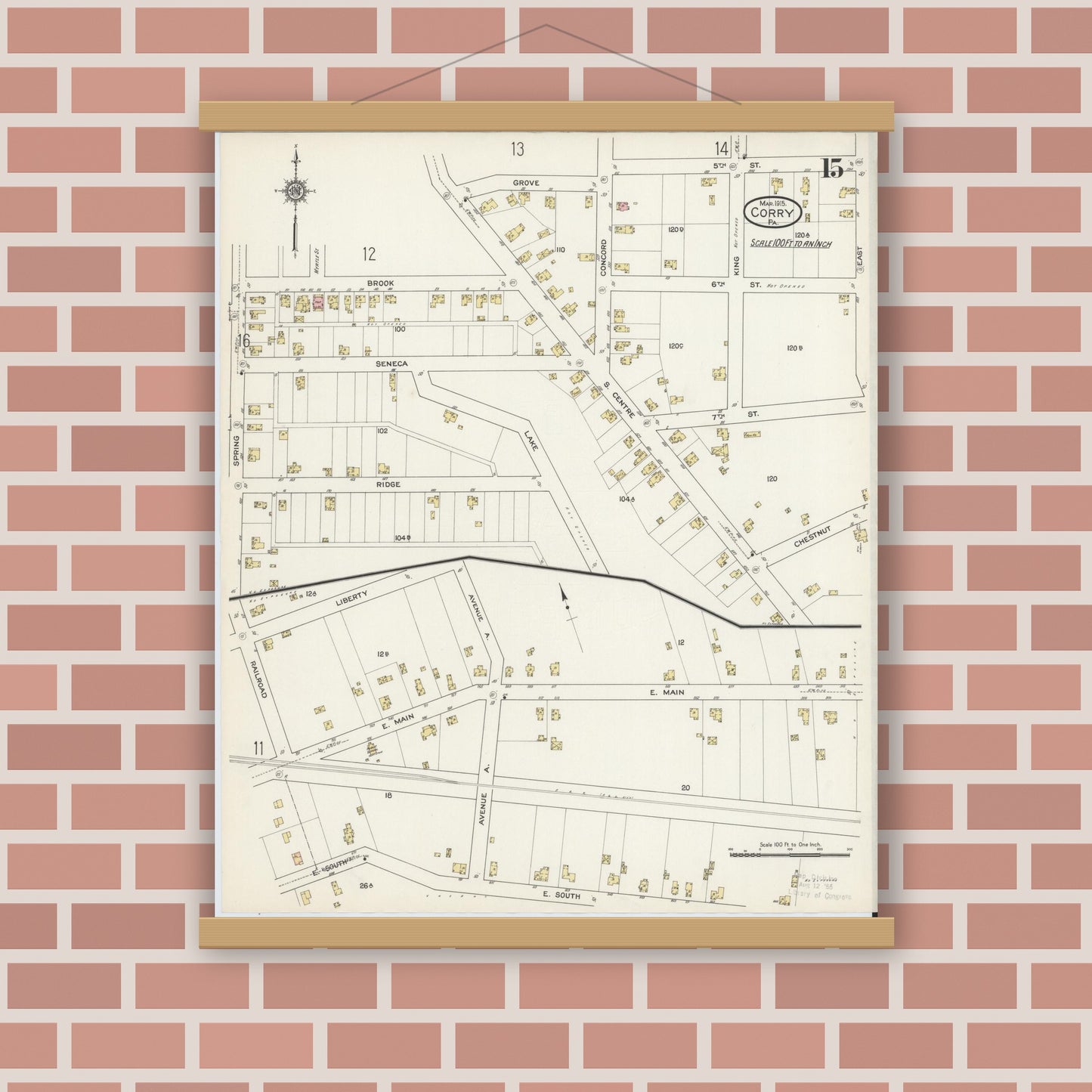 Old map wall art mockup — magnetic wood frame on brick wall — Sanborn Fire Insurance Map from Corry, Erie County, Pennsylvania (1915), Sheet #0015