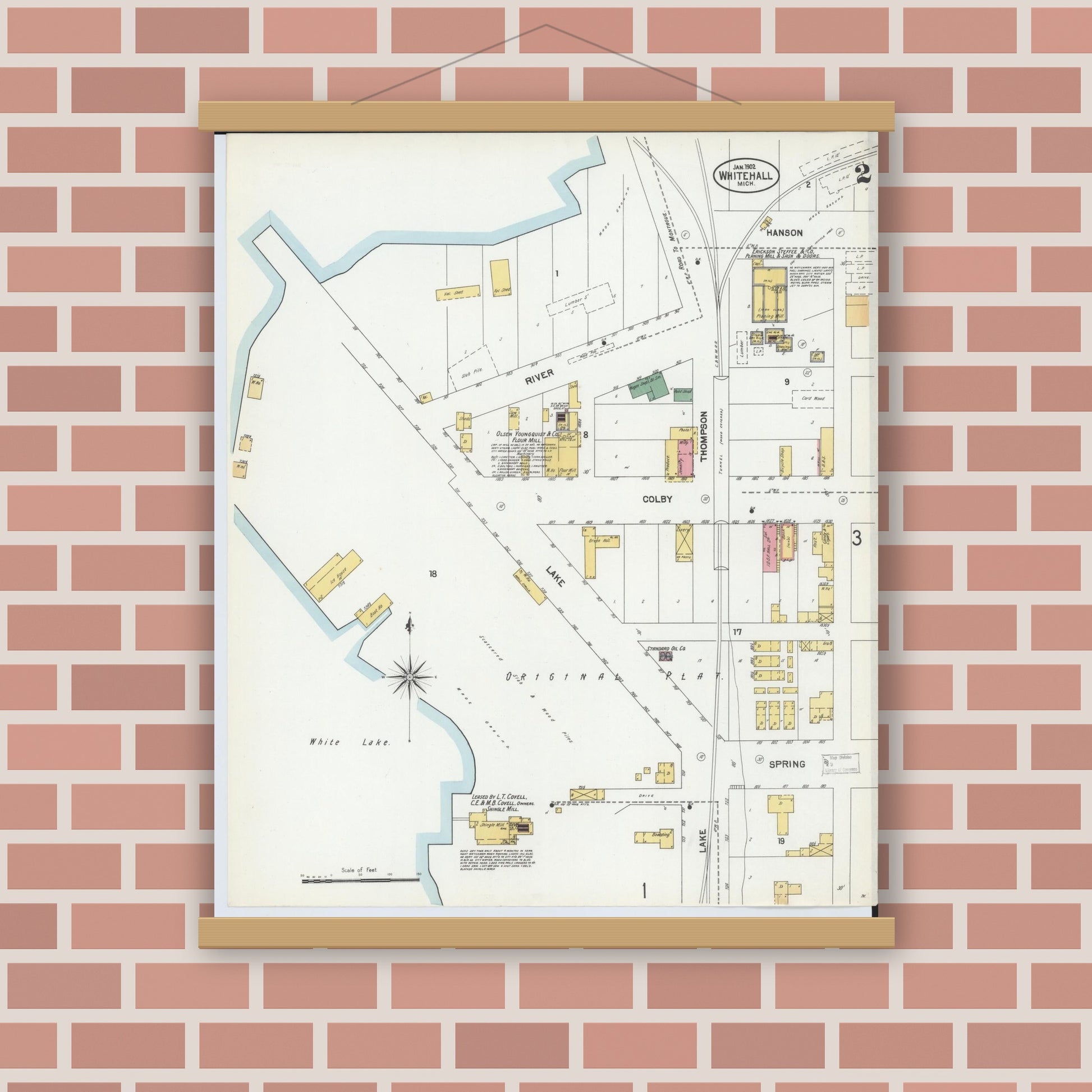 Old map wall art mockup — magnetic wood frame on brick wall — Sanborn Fire Insurance Map from Whitehall, Muskegon County, Michigan (1902), Sheet #0002