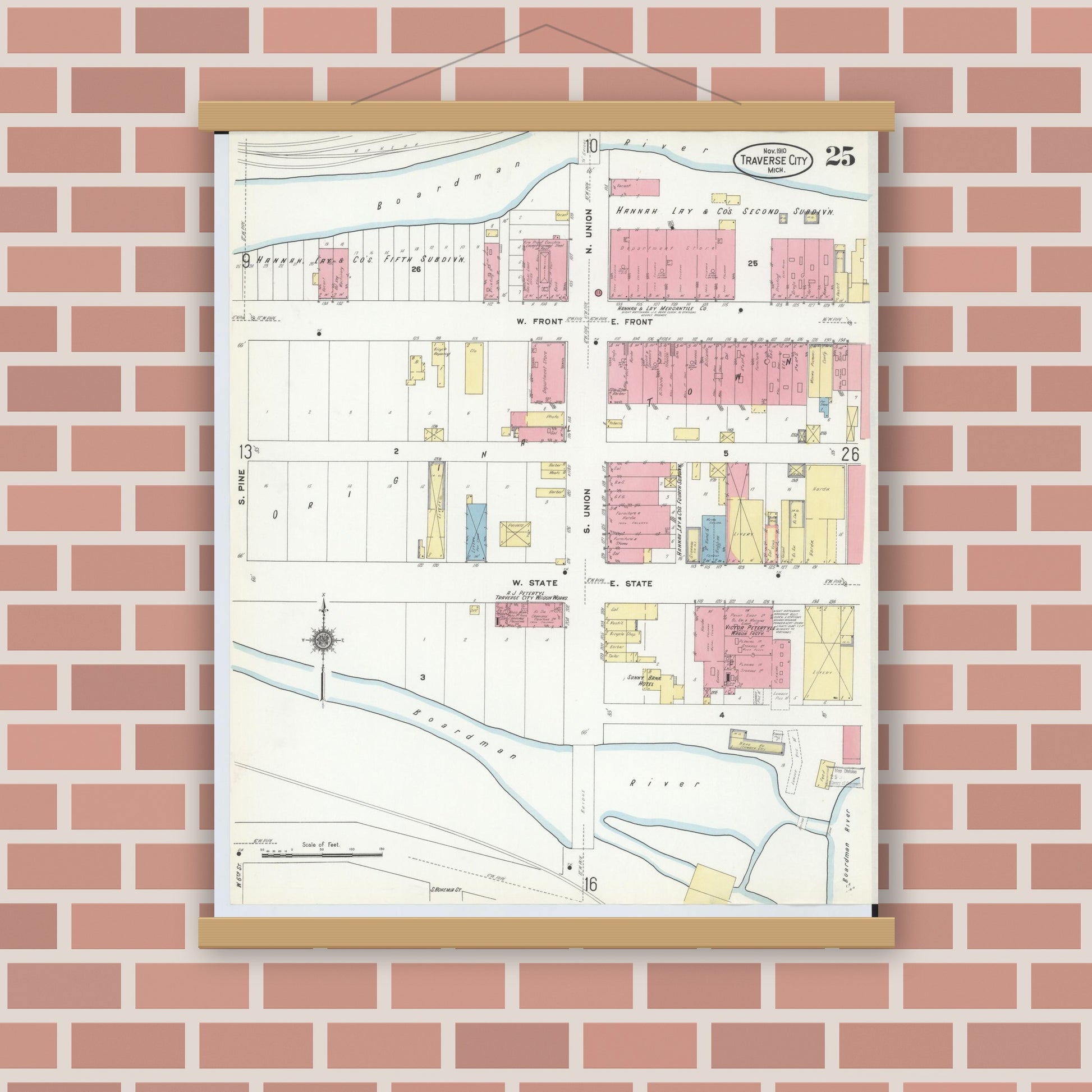 Old map wall art mockup — magnetic wood frame on brick wall — Sanborn Fire Insurance Map from Traverse City, Grand Traverse County, Michigan (1910), Sheet #0025