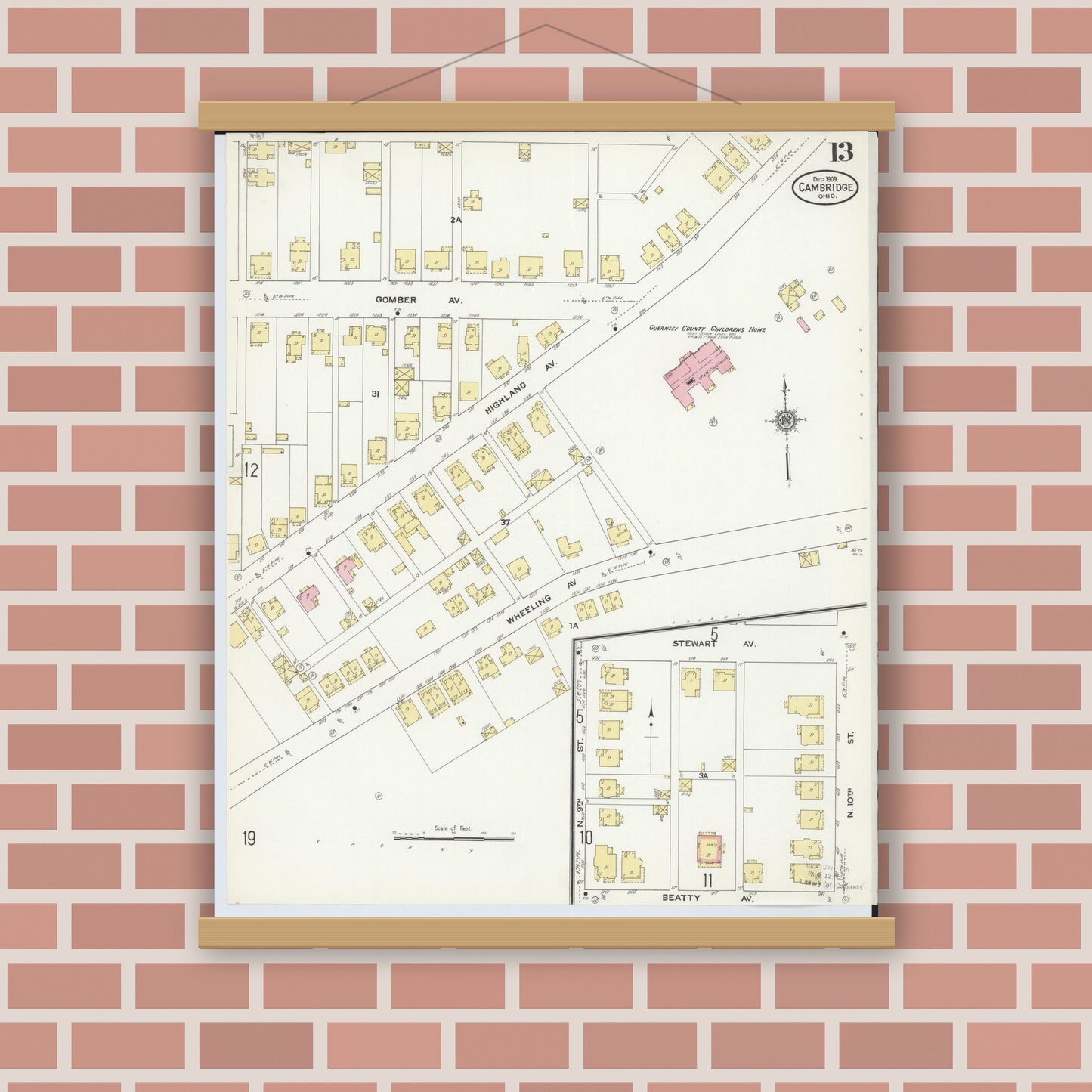 Old map wall art mockup — magnetic wood frame on brick wall — Sanborn Fire Insurance Map from Cambridge, Guernsey County, Ohio (1909), Sheet #0013